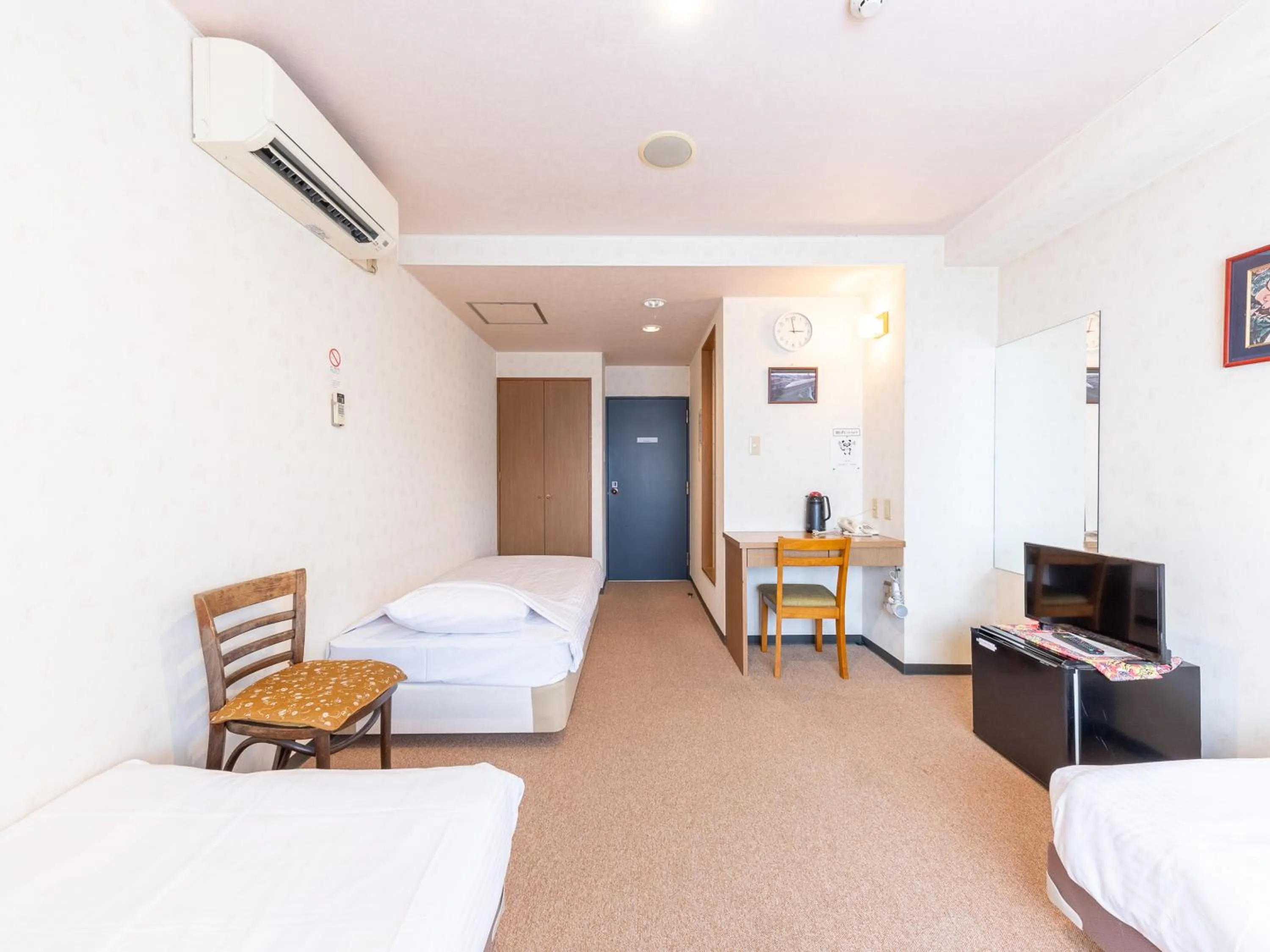 Bed in Tabist Business Hotel R Side Kanazawa