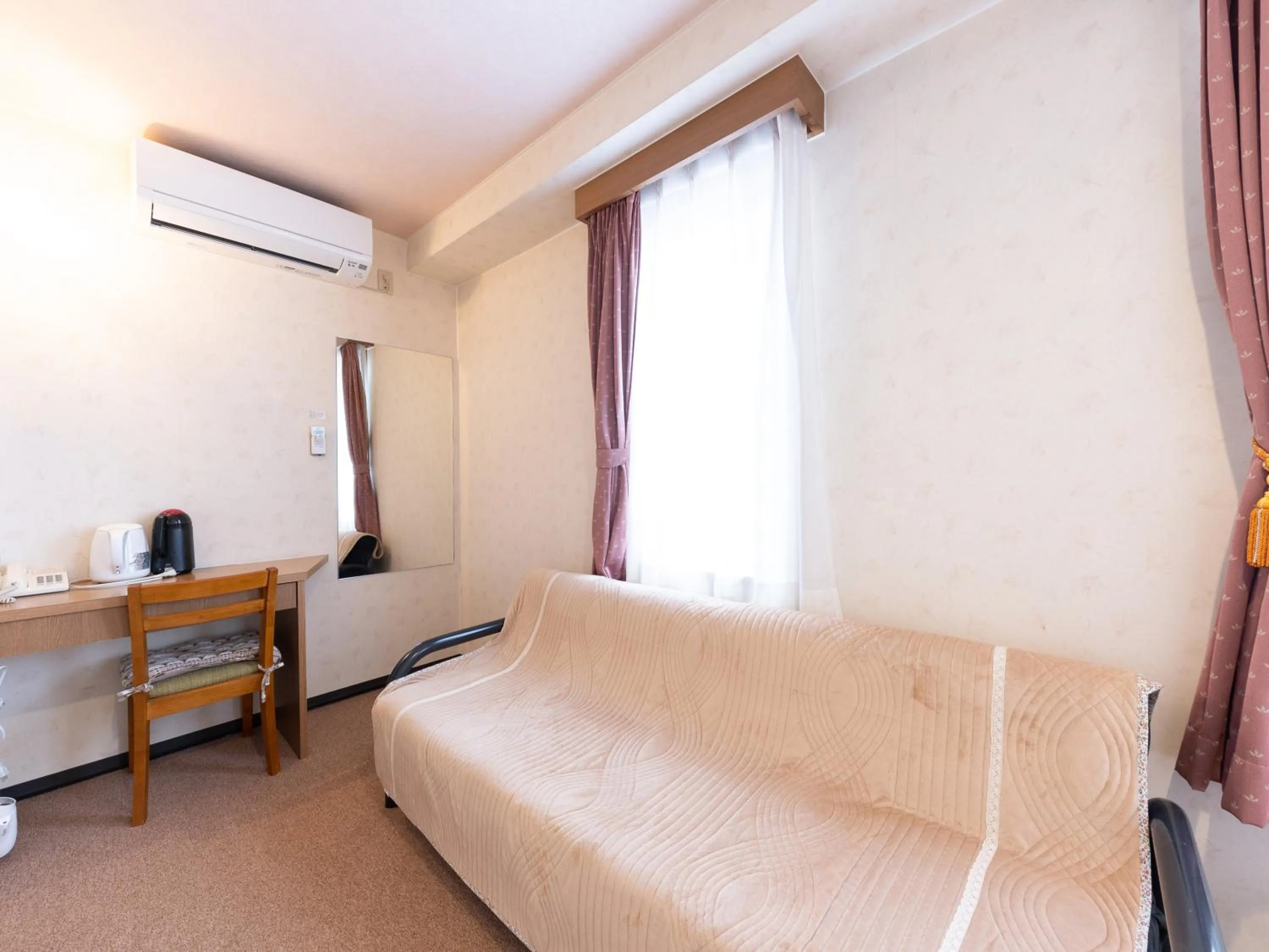 Bed in Tabist Business Hotel R Side Kanazawa