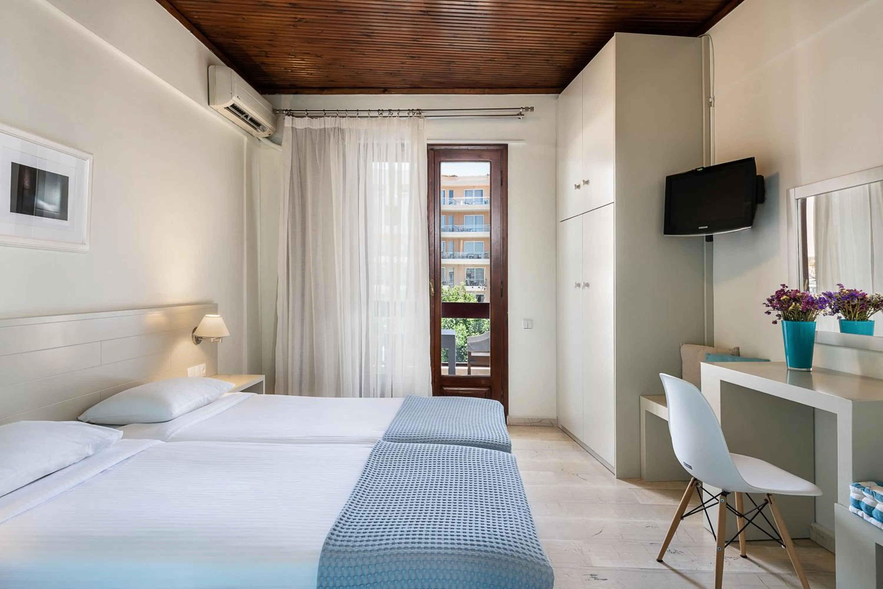 Bed in Magia Apartments