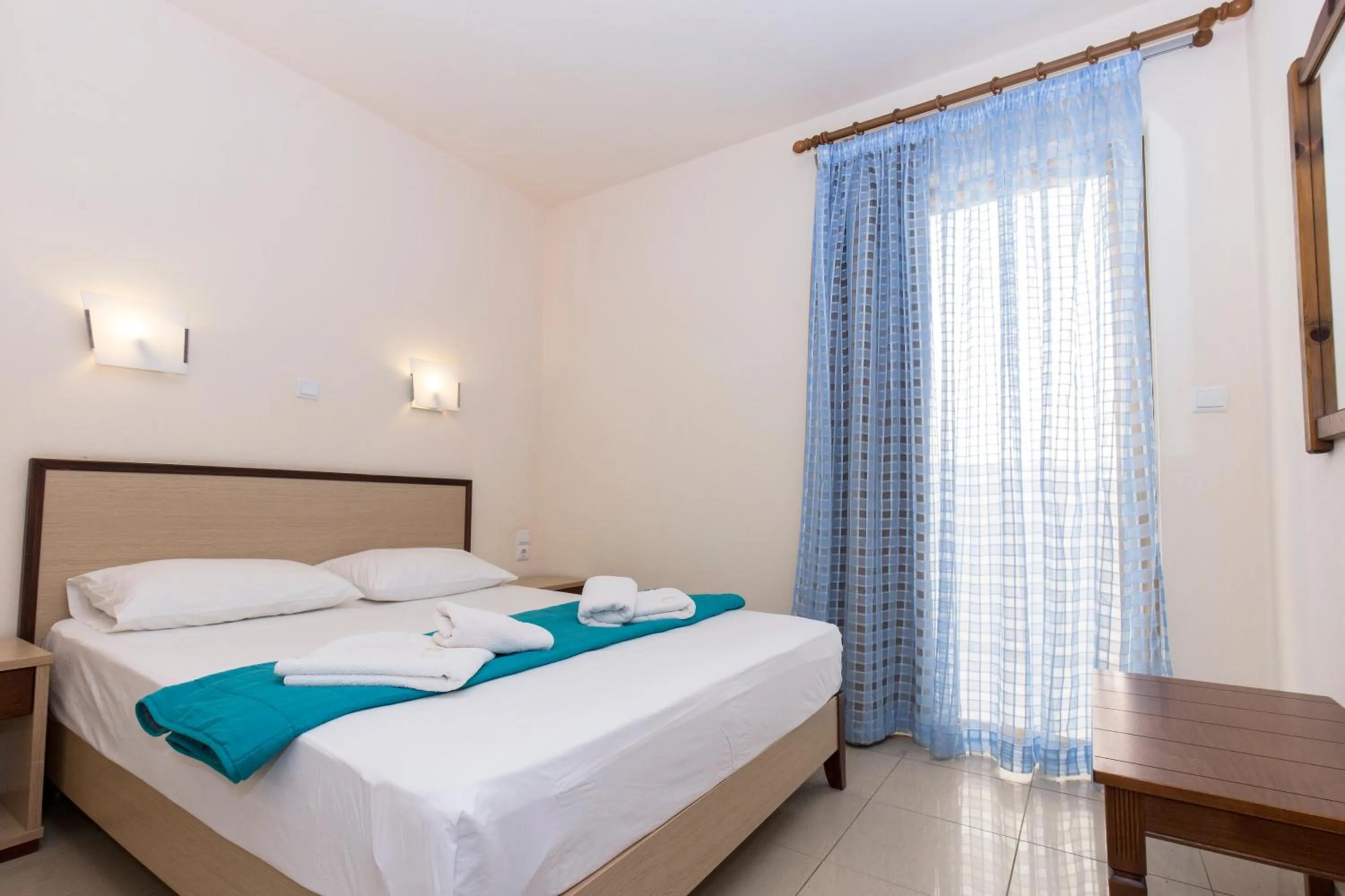 Bedroom in Mandy Suites