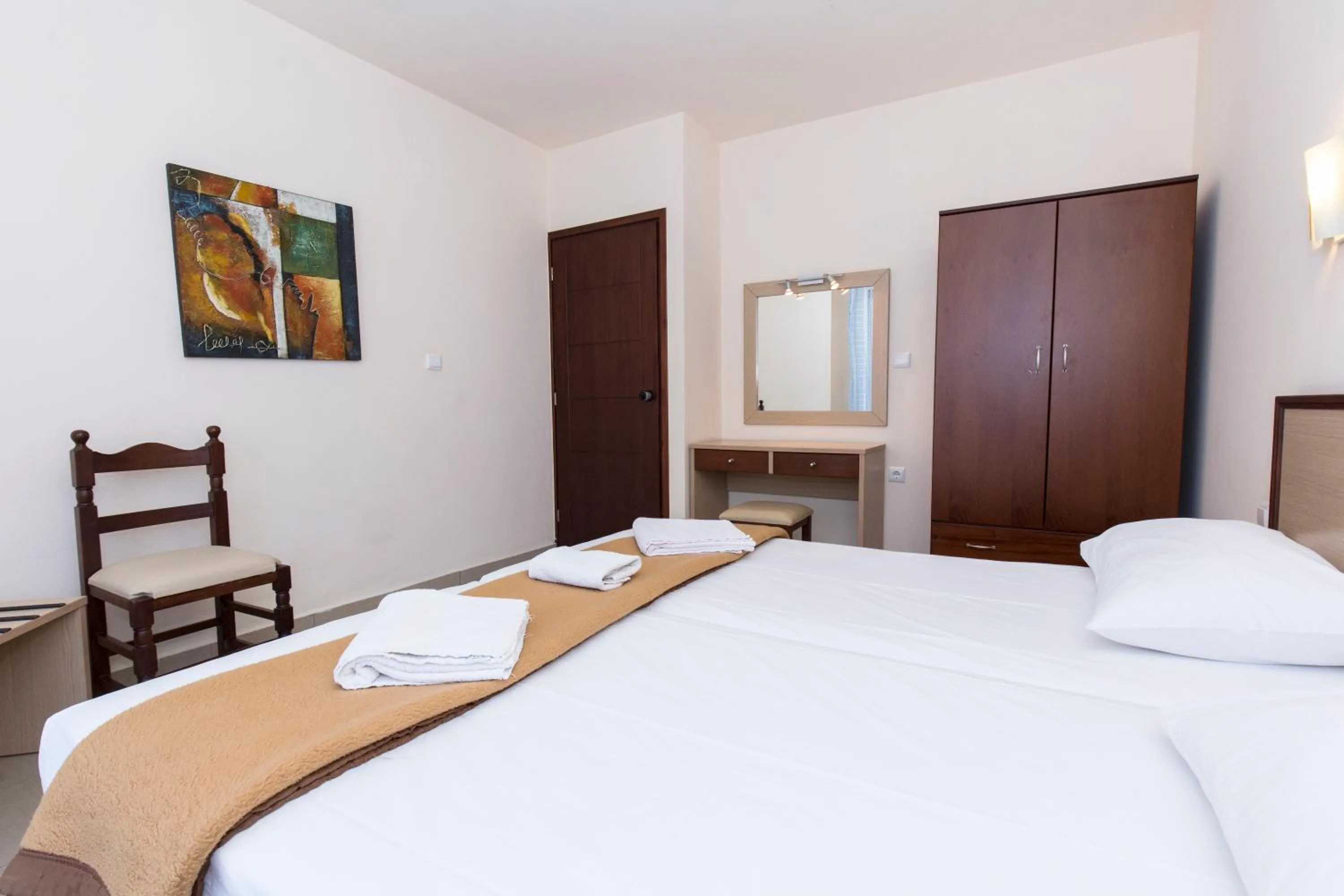 Bedroom in Mandy Suites