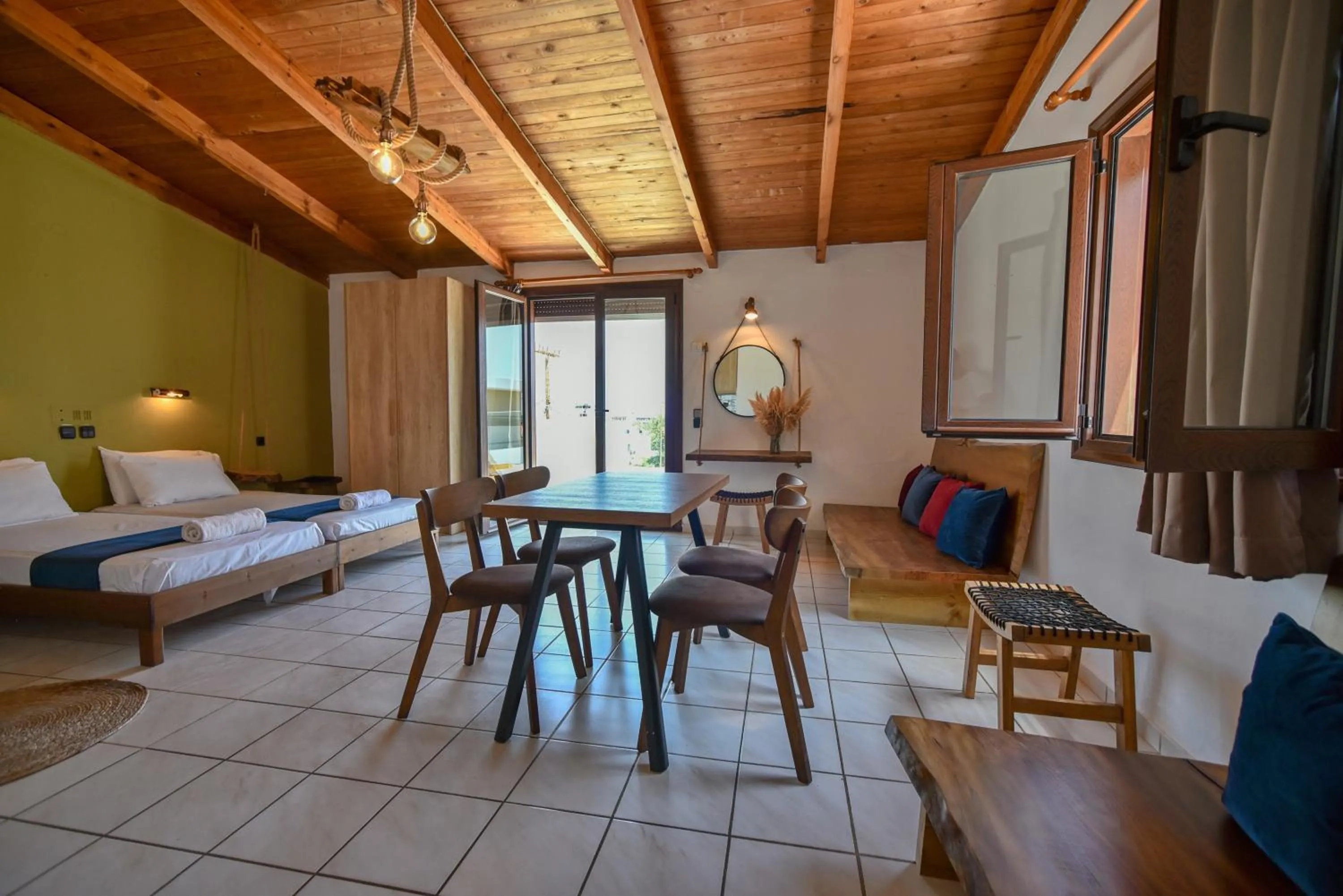 Living room, Bed in Iraklis Apartments