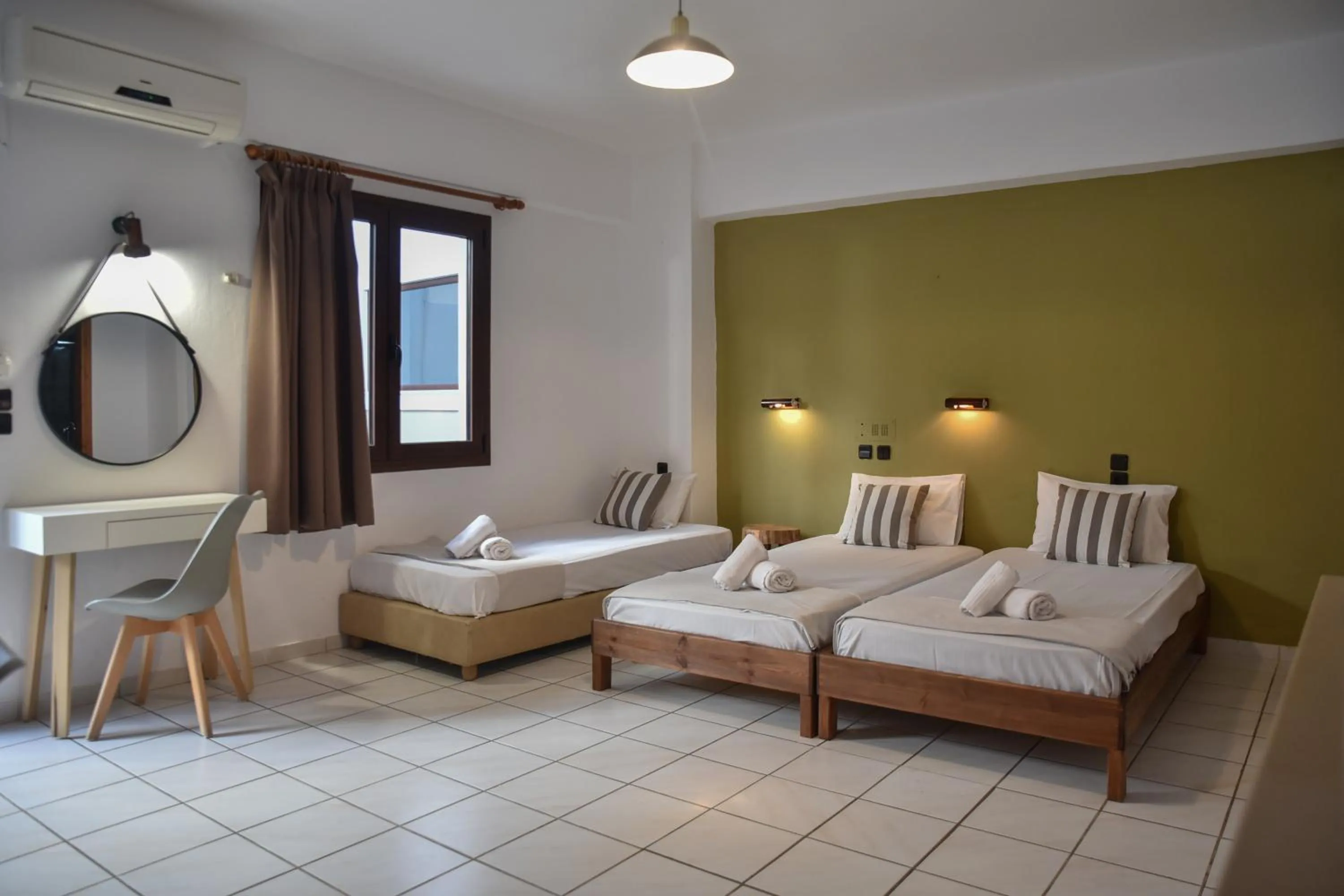 Bed in Iraklis Apartments