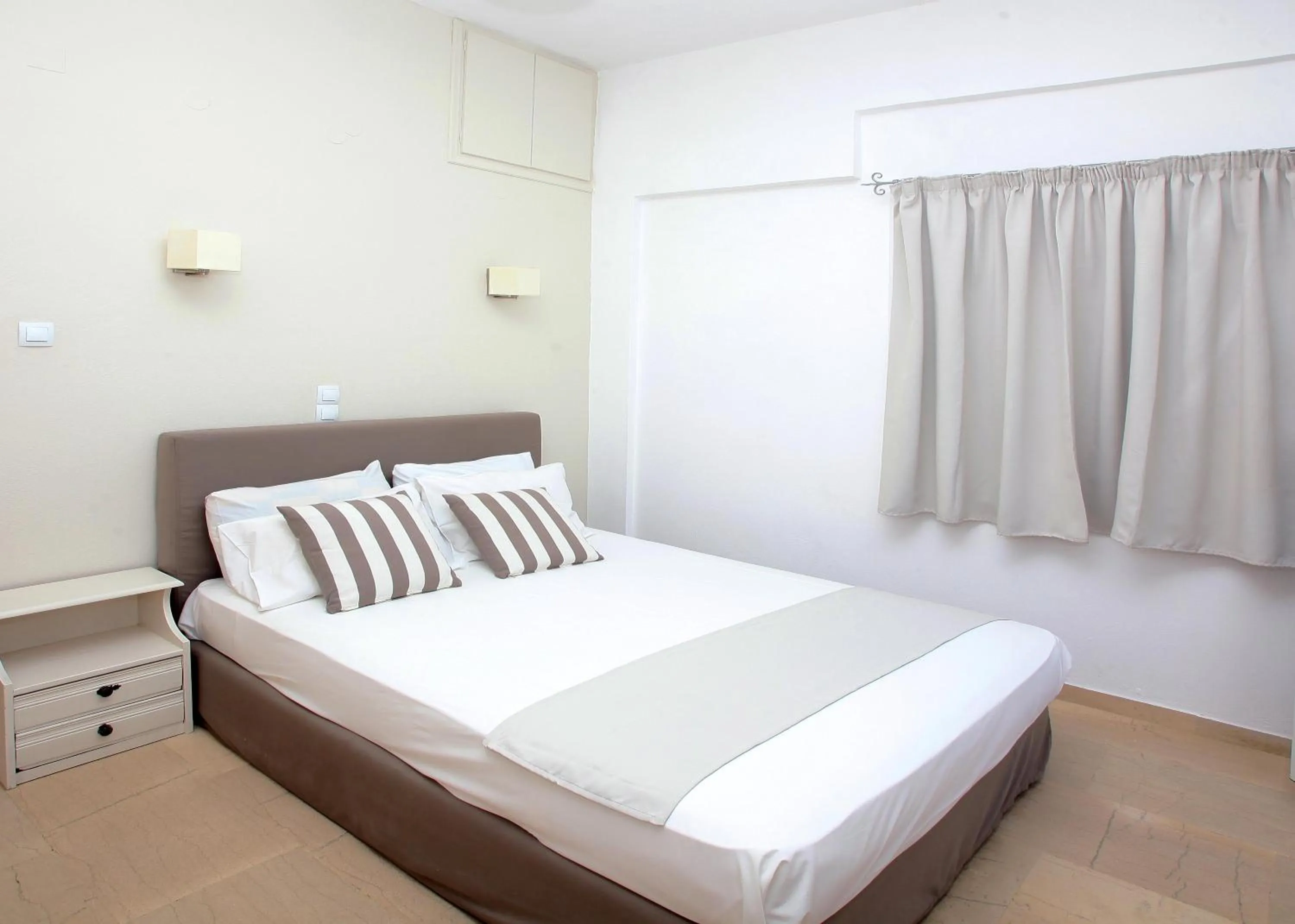 Bed in Iraklis Apartments