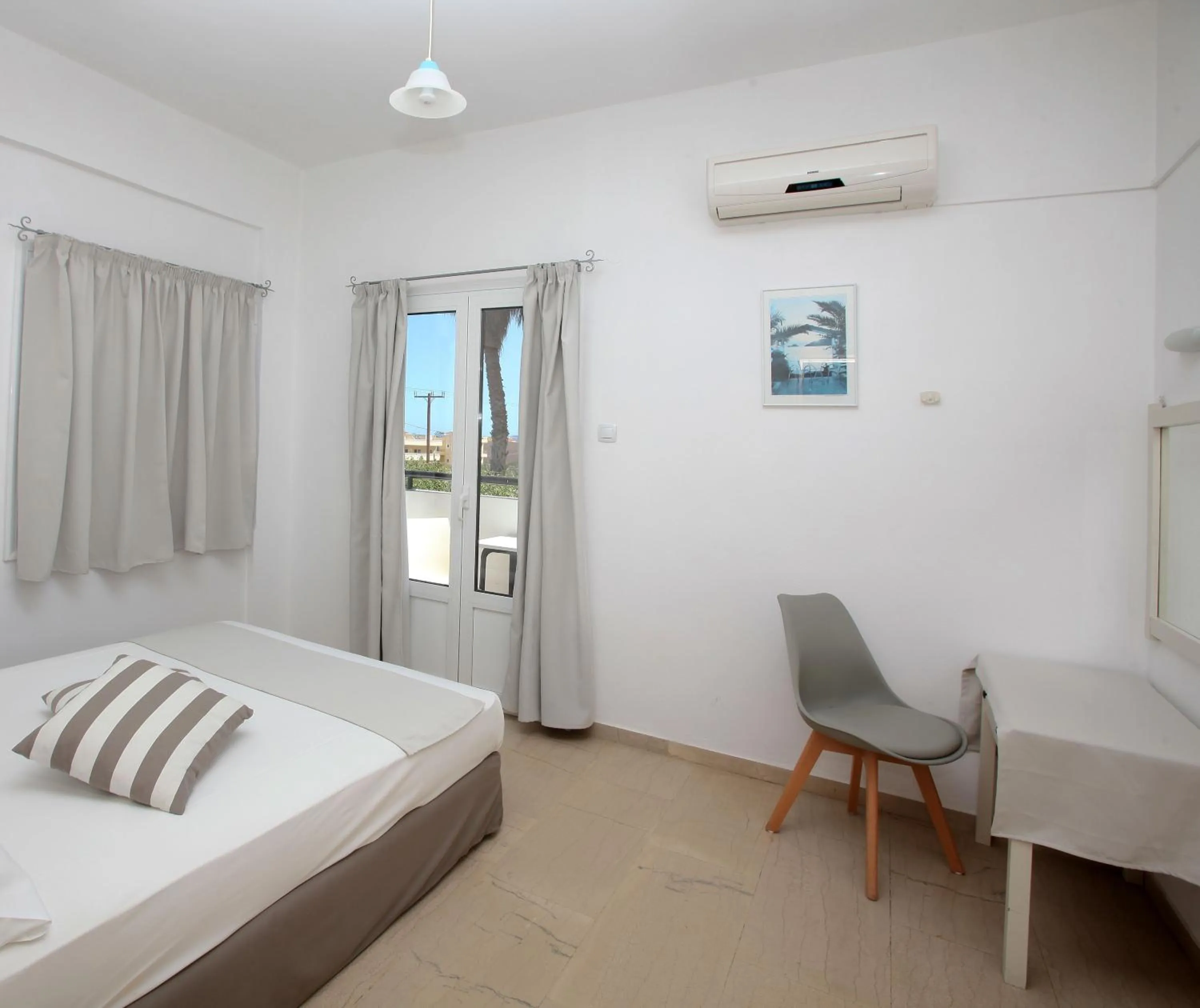 Living room, Bed in Iraklis Apartments