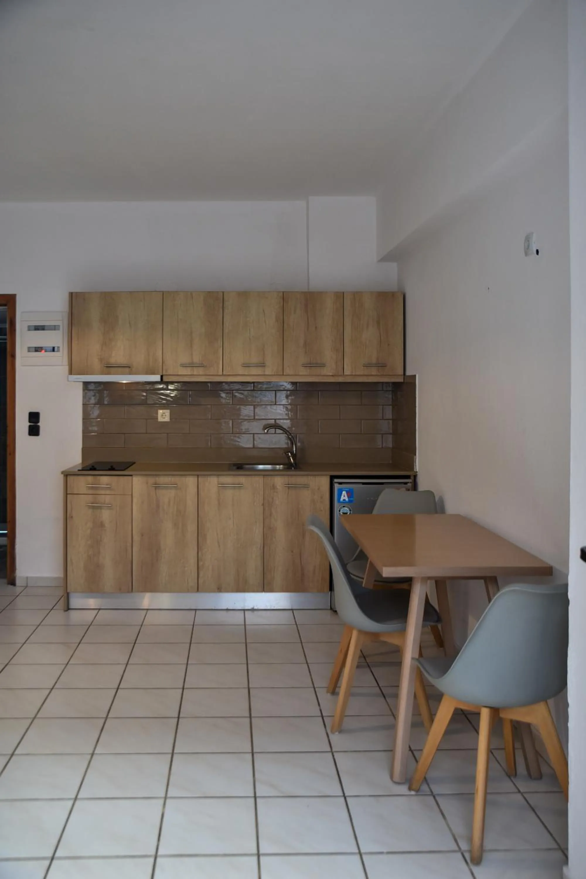 Kitchen or kitchenette in Iraklis Apartments