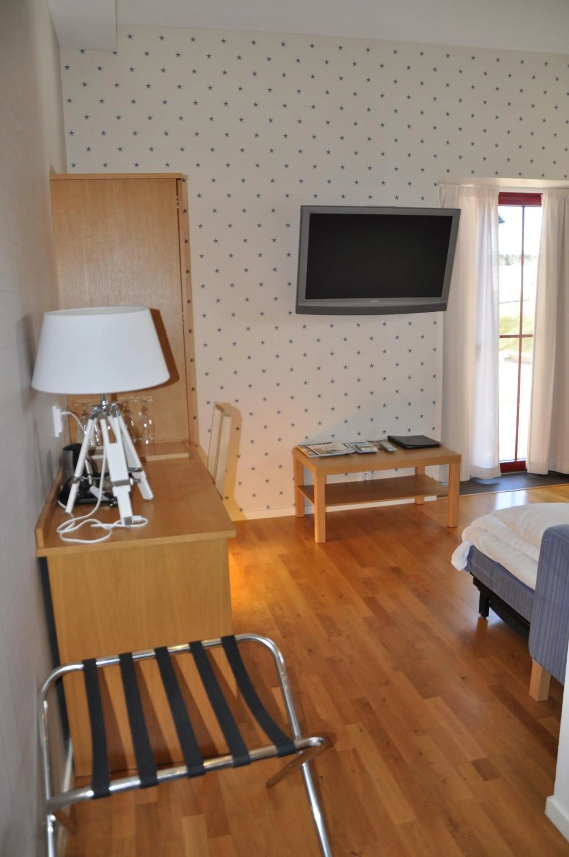 Living room, Bed in Hotel Bella Luna