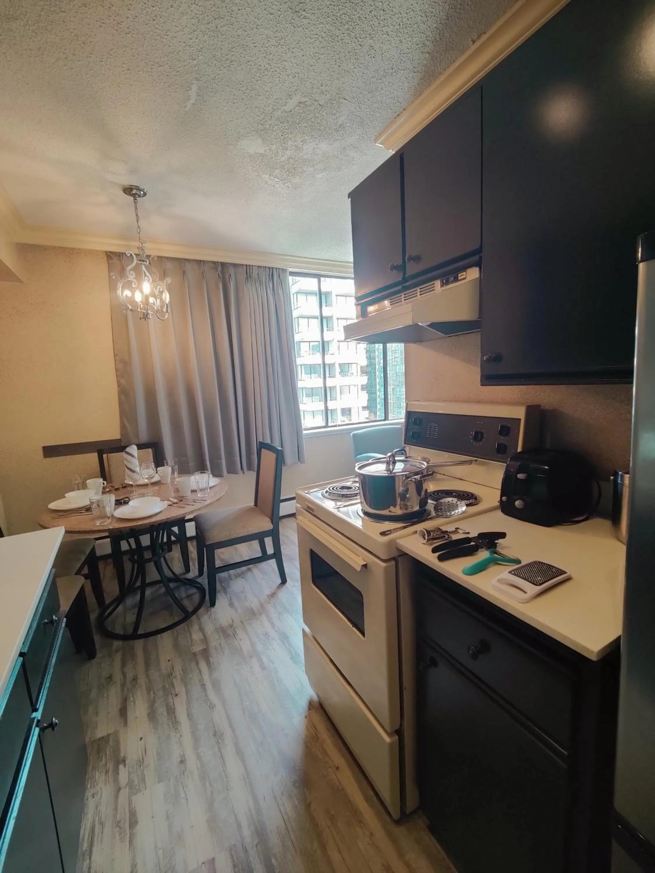 Kitchen or kitchenette in Divya Sutra Suites on Robson Downtown Vancouver