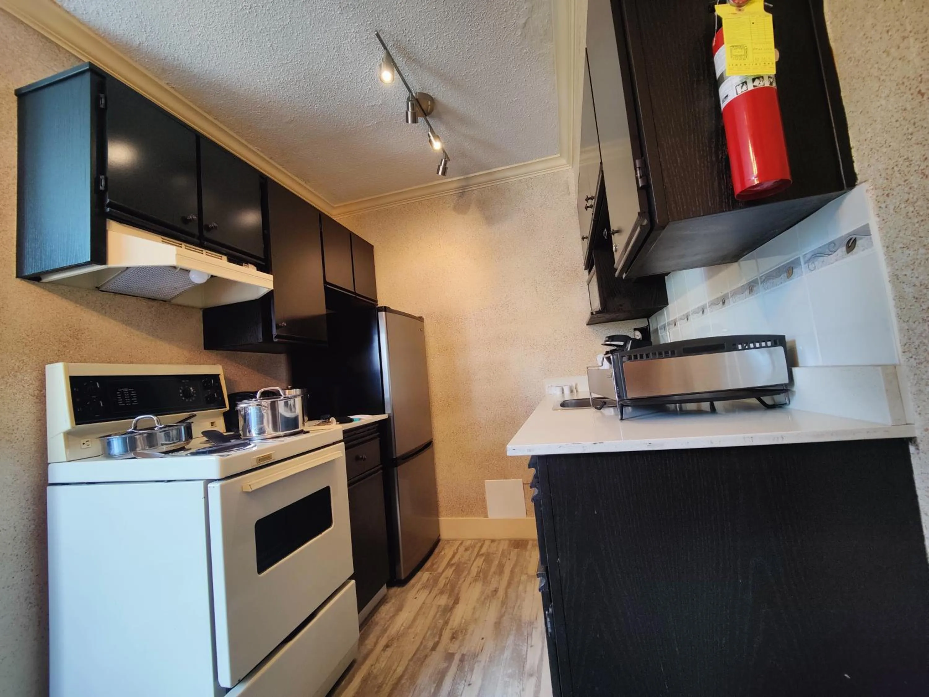 Kitchen or kitchenette in Divya Sutra Suites on Robson Downtown Vancouver