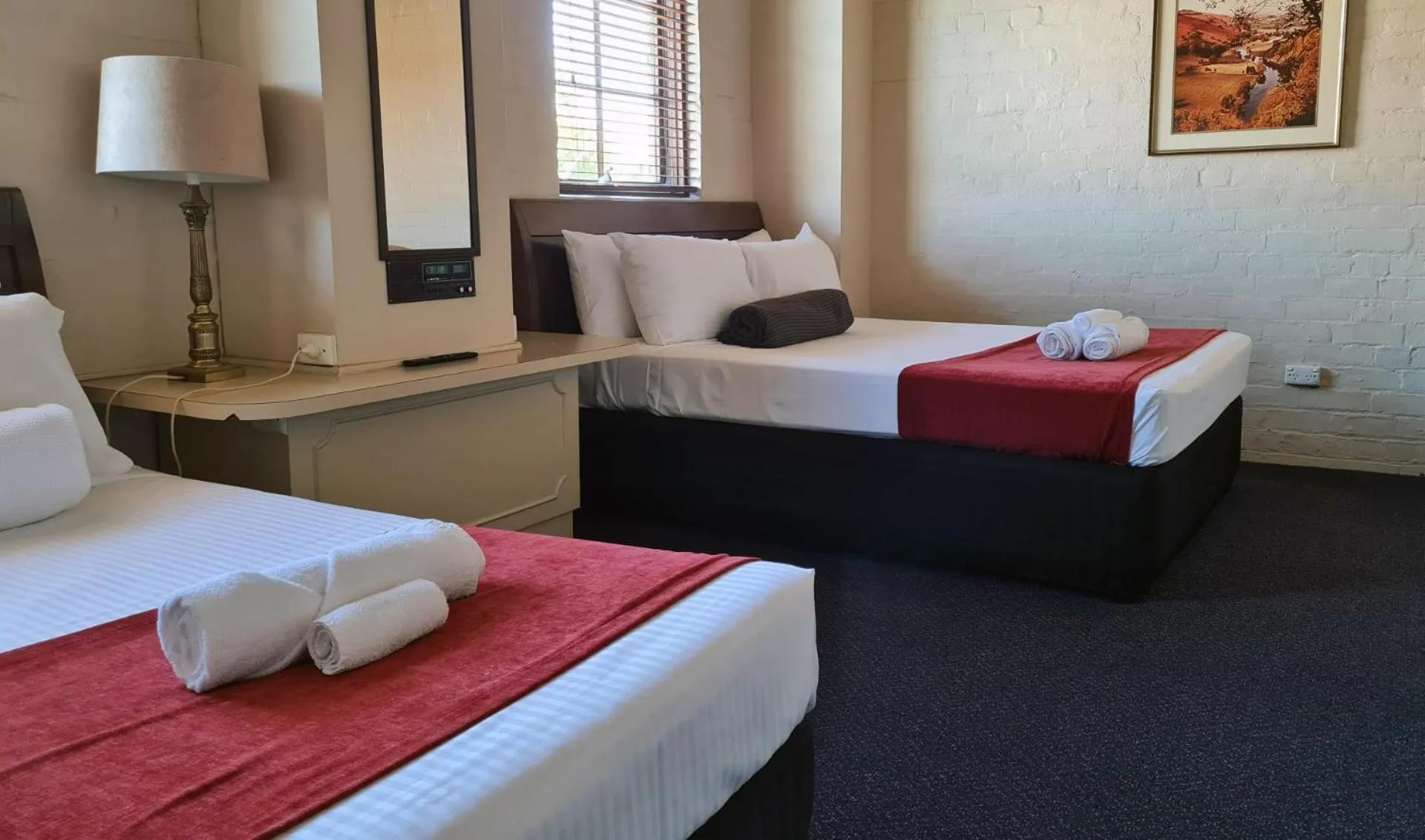 Bed in Seaton Arms Motor Inn