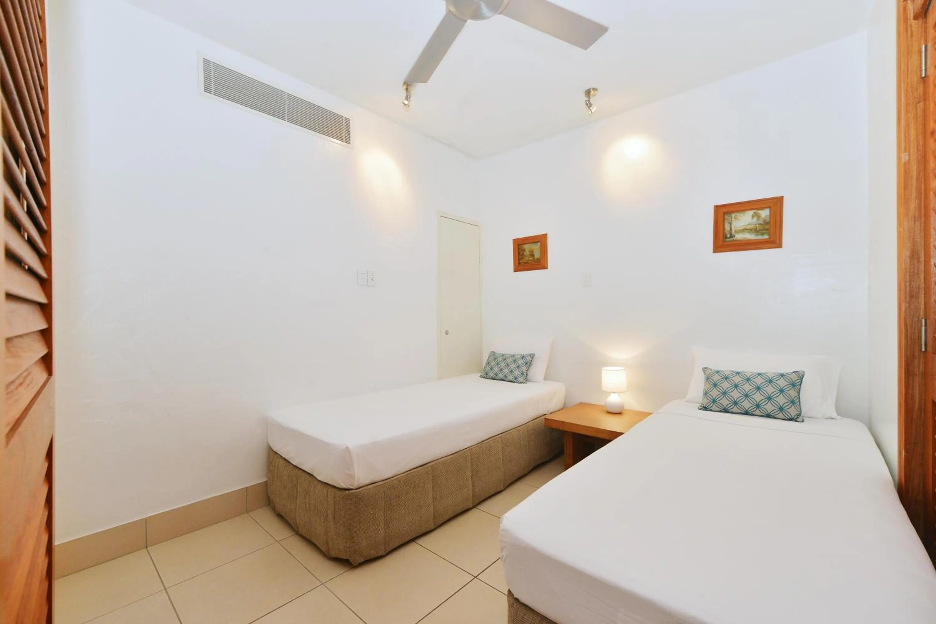 Bed in Club Tropical Resort - Official Onsite Reception & Check In