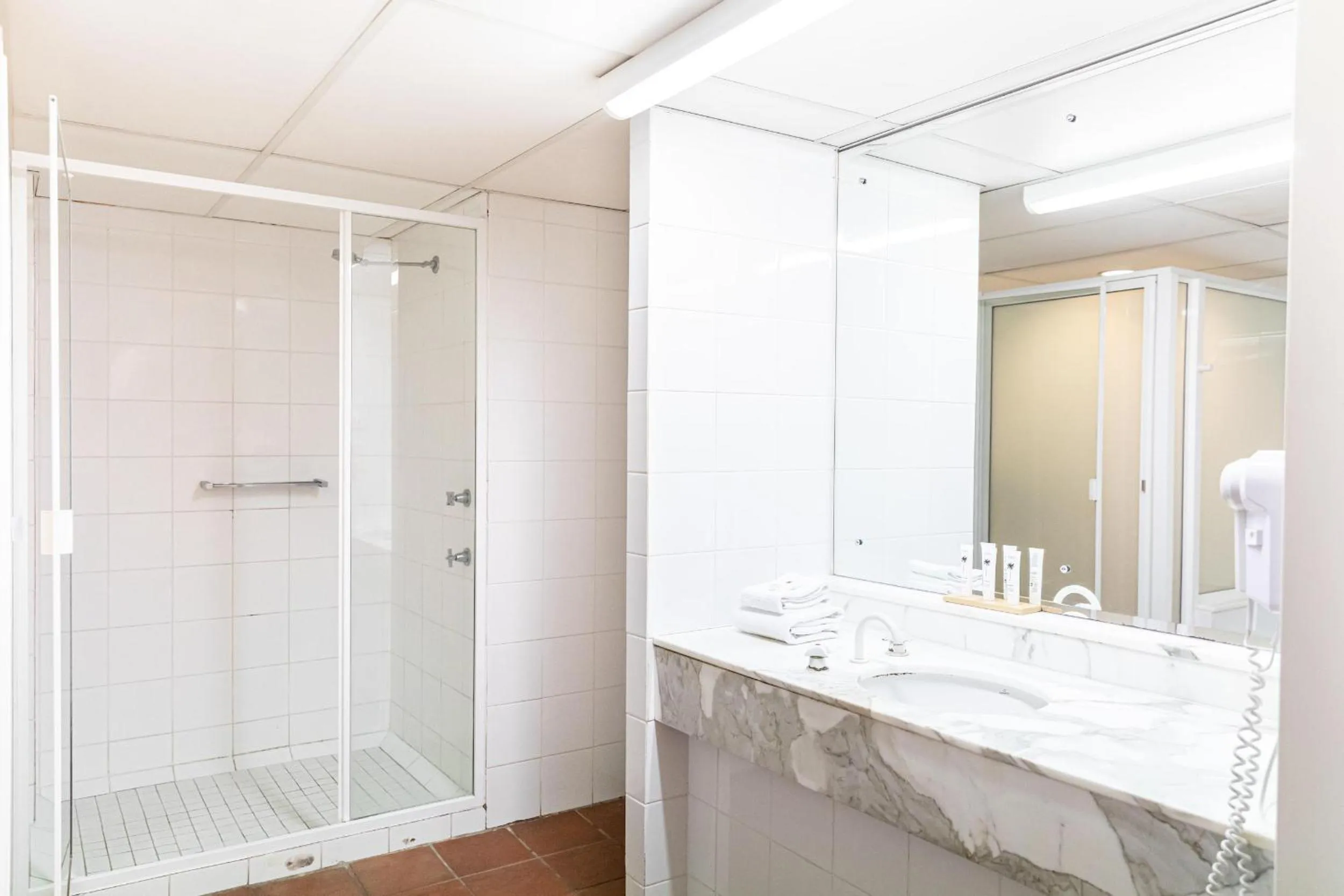 Shower in Club Tropical Resort - Official Onsite Reception & Check In