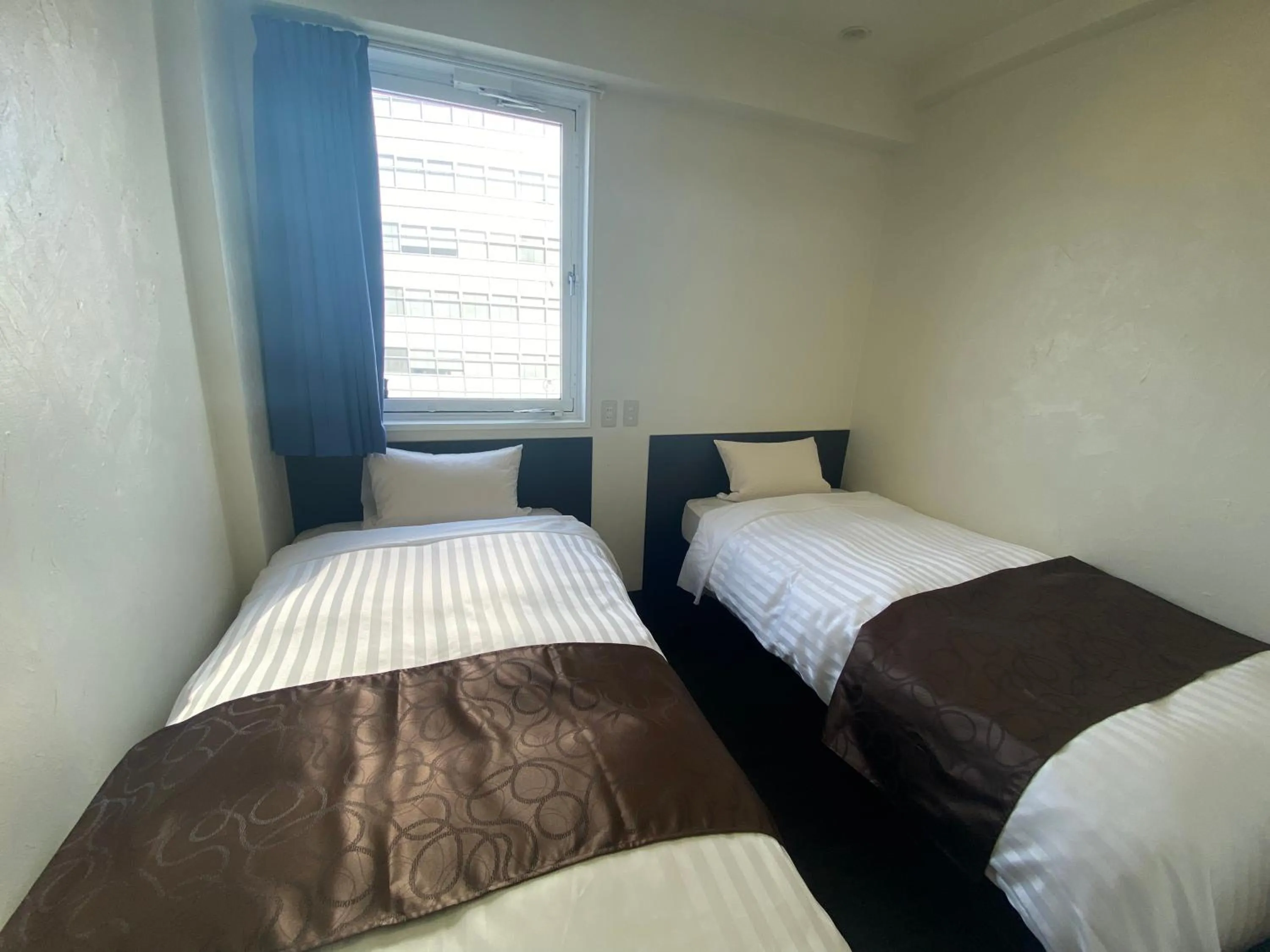 Bed in Hotel Mayflower Sendai