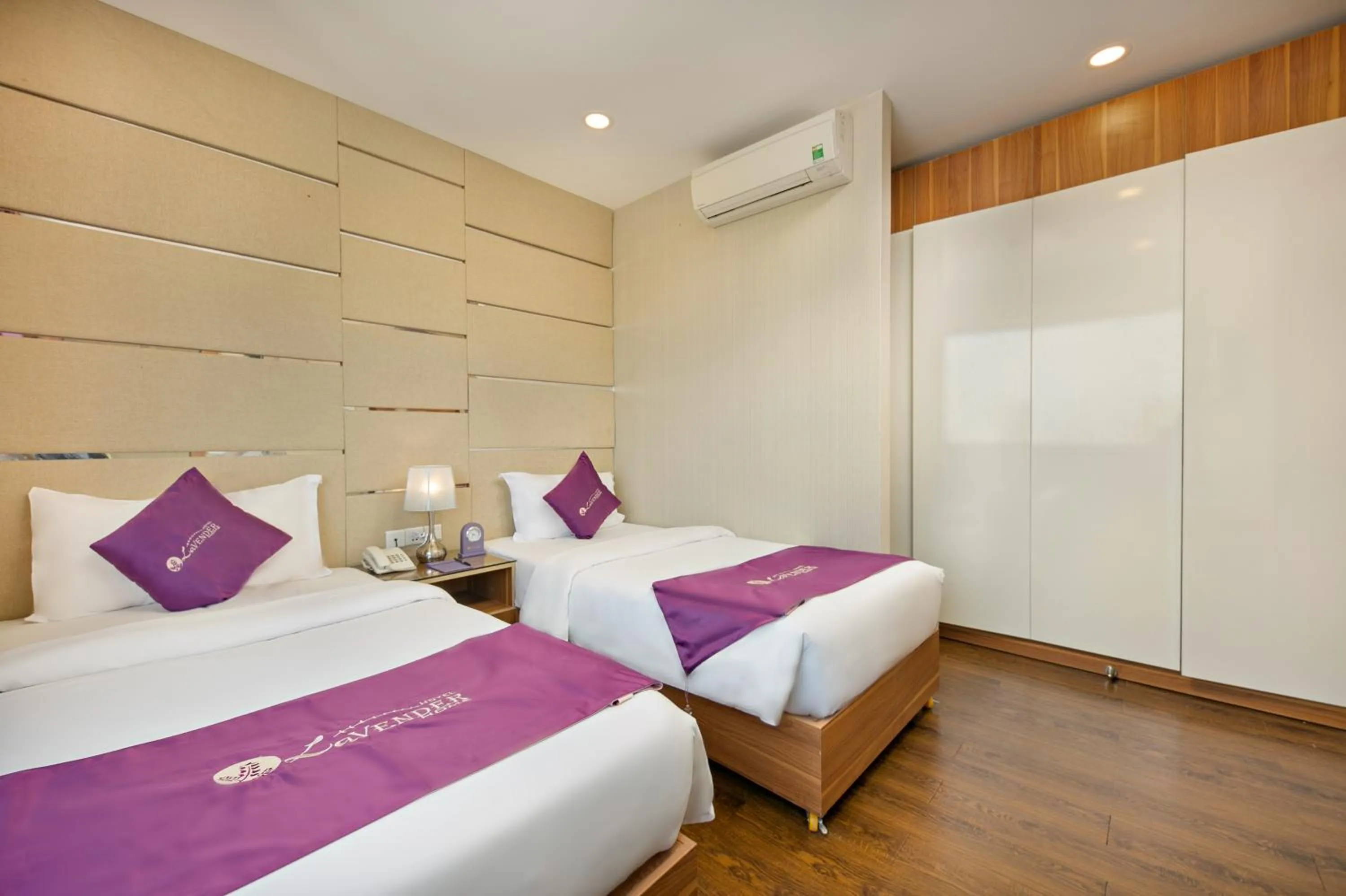 Bed in Lavender Riverside Hotel