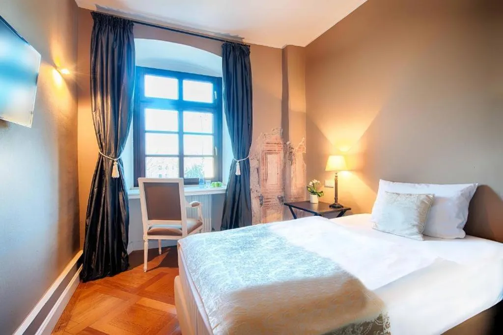 Bed in Hotel Schloss Lehen