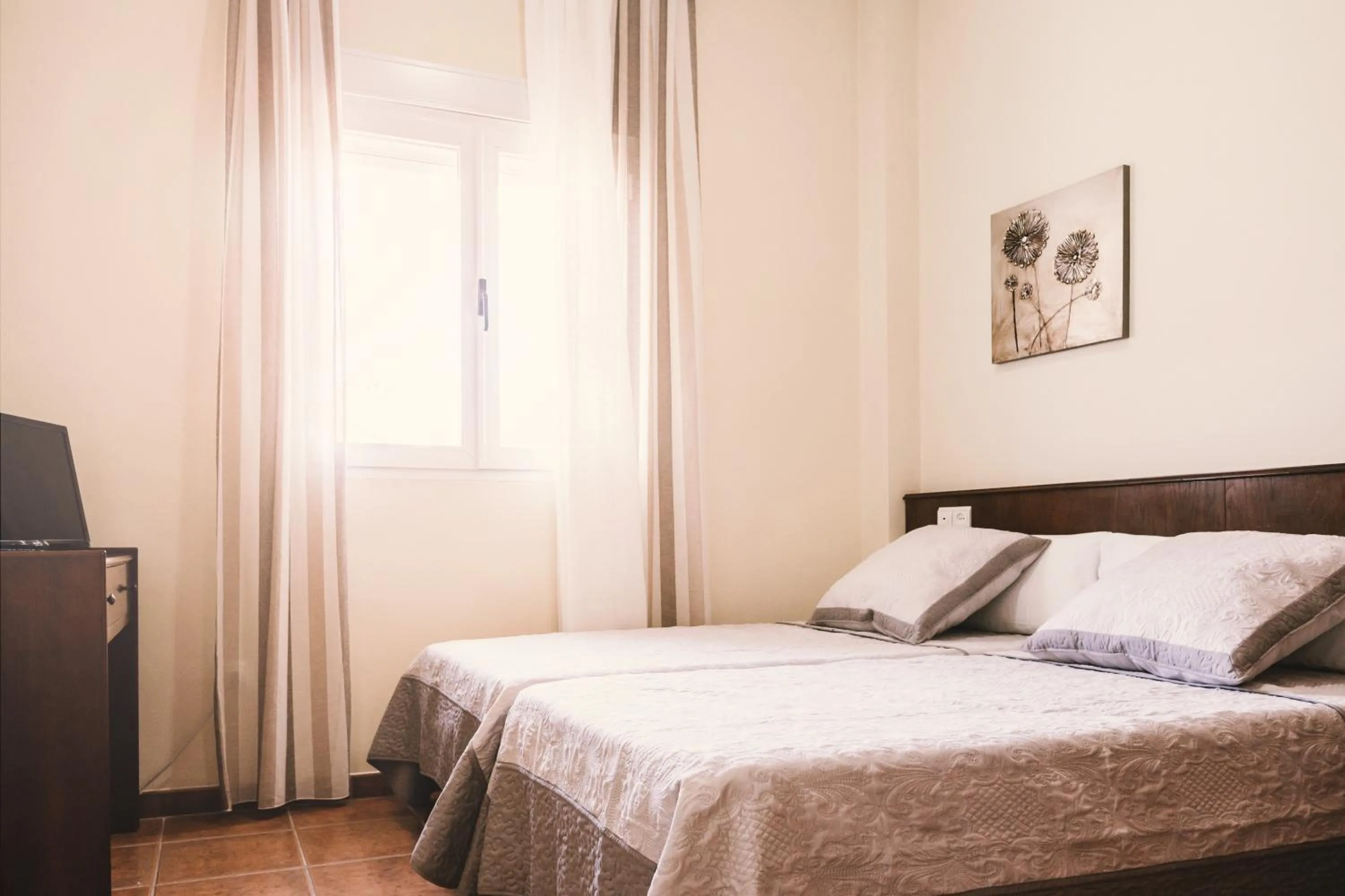 Bed in Hostal La Laguna