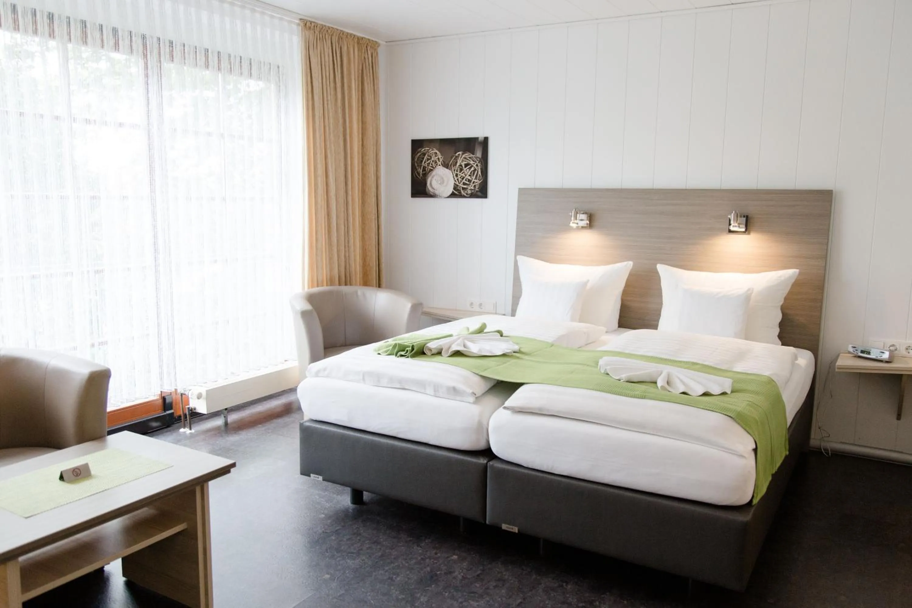 Bed in Friesen Hotel