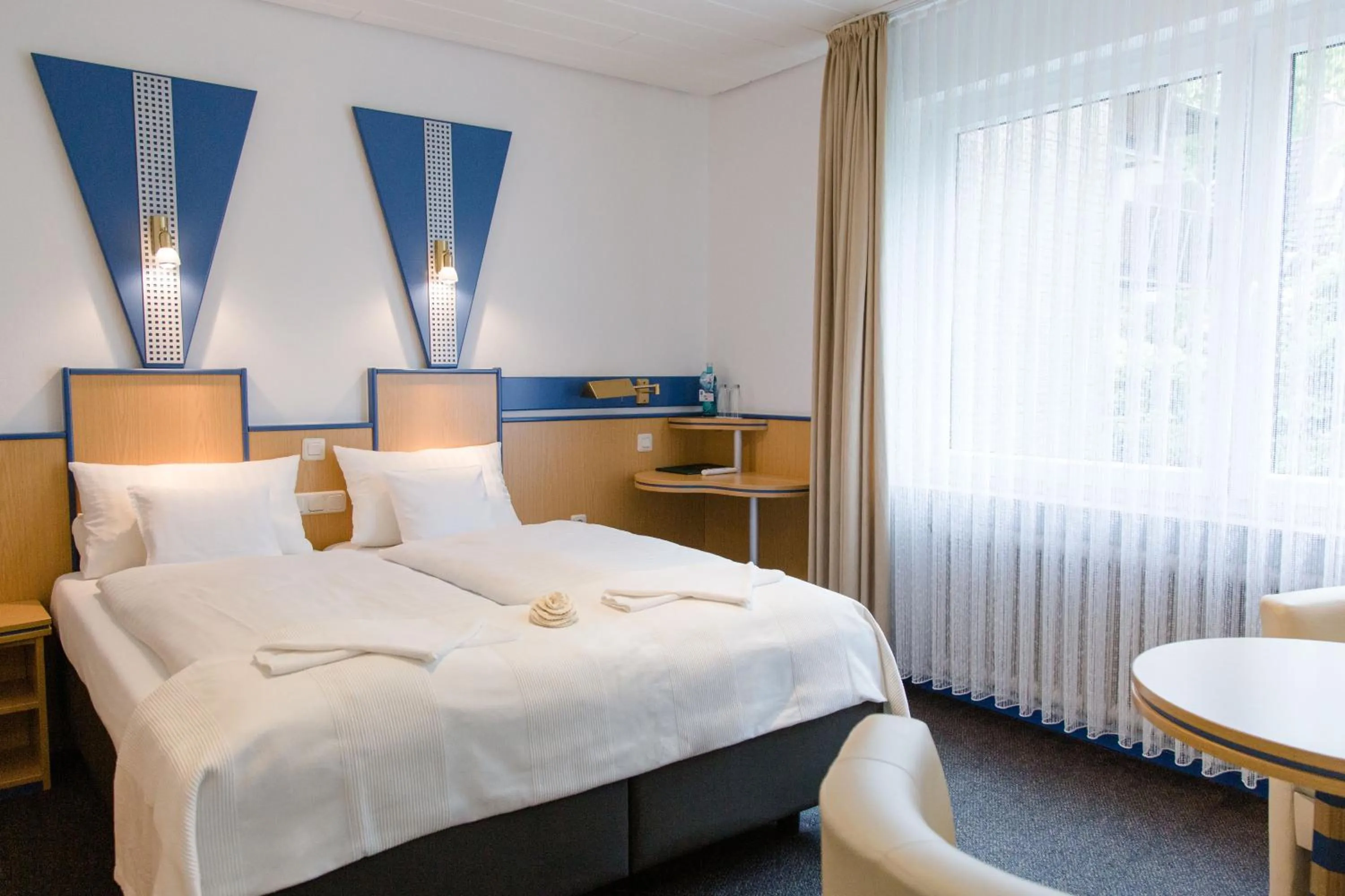 Bed in Friesen Hotel