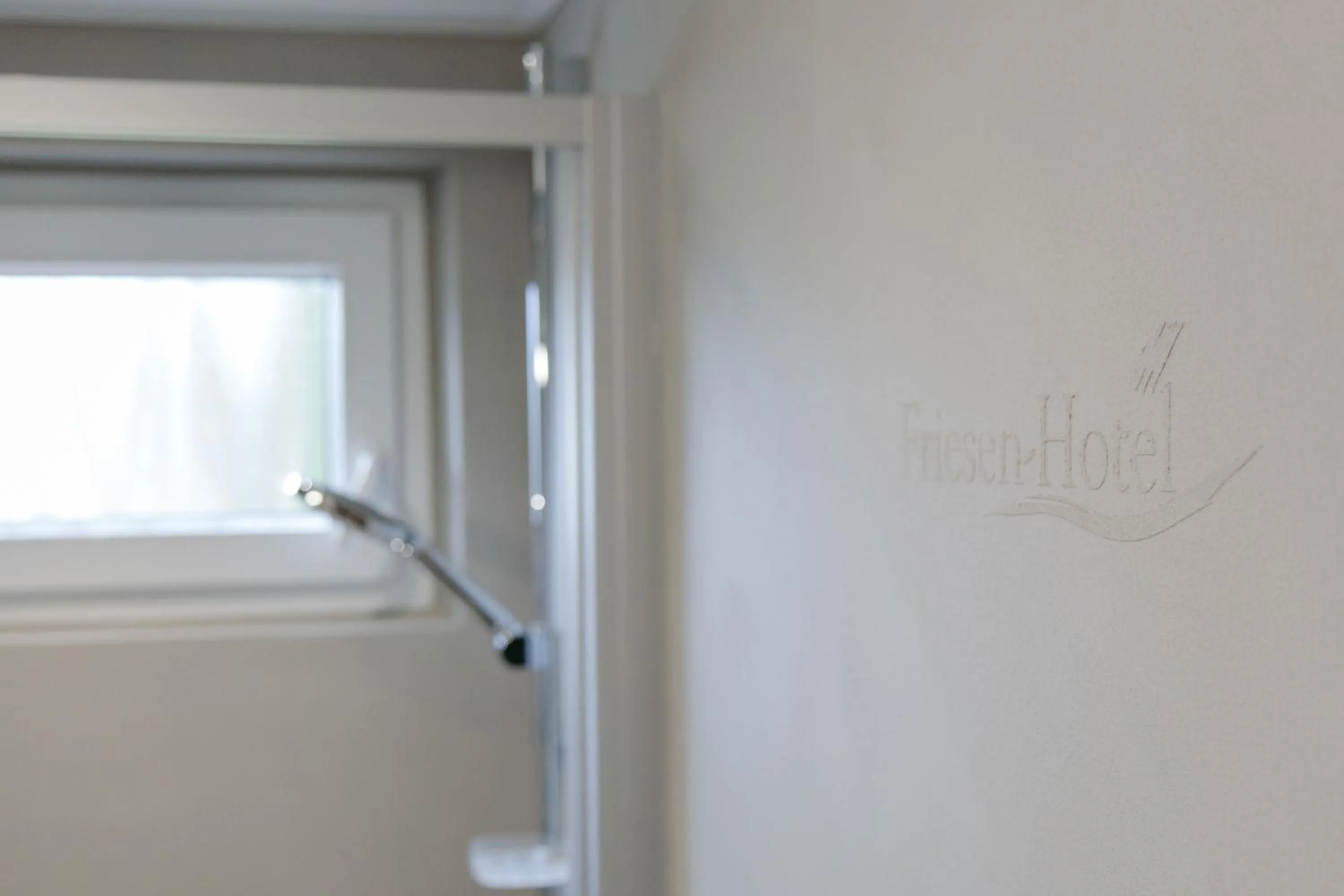 Property logo or sign in Friesen Hotel