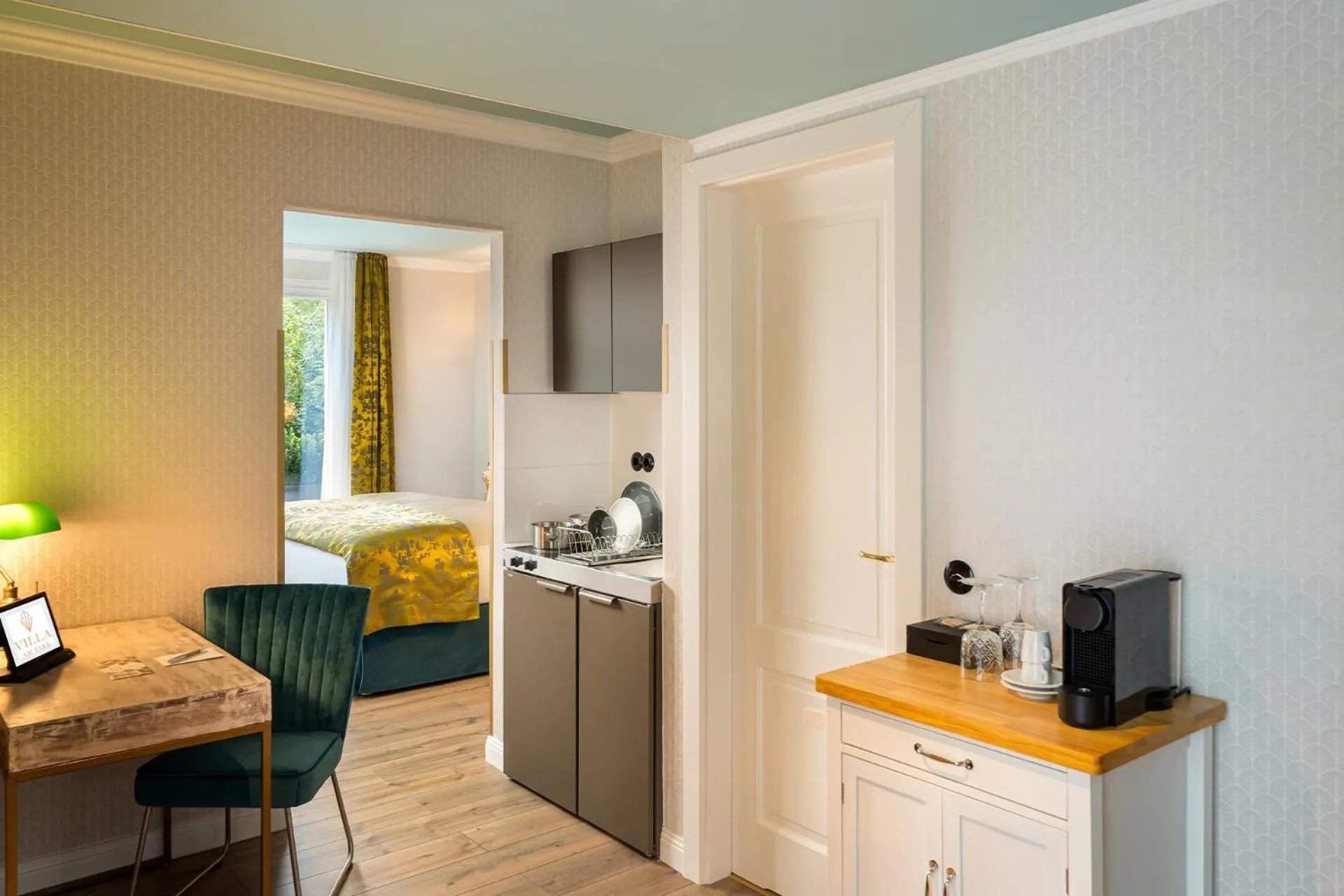 Kitchen or kitchenette in Parkhotel Landau