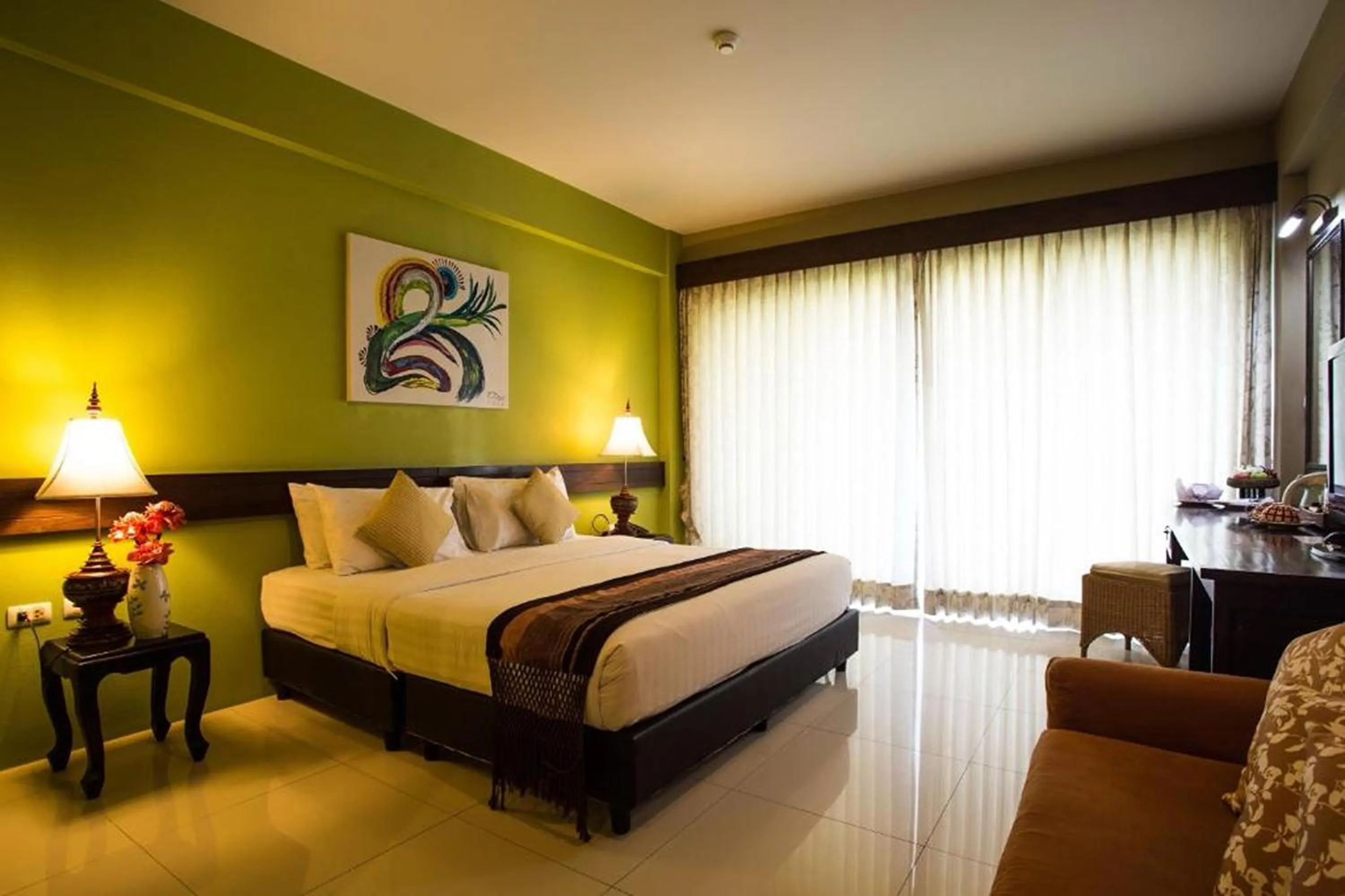 Photo of the whole room, Bed in Poonyamantra Resort Chiang Rai