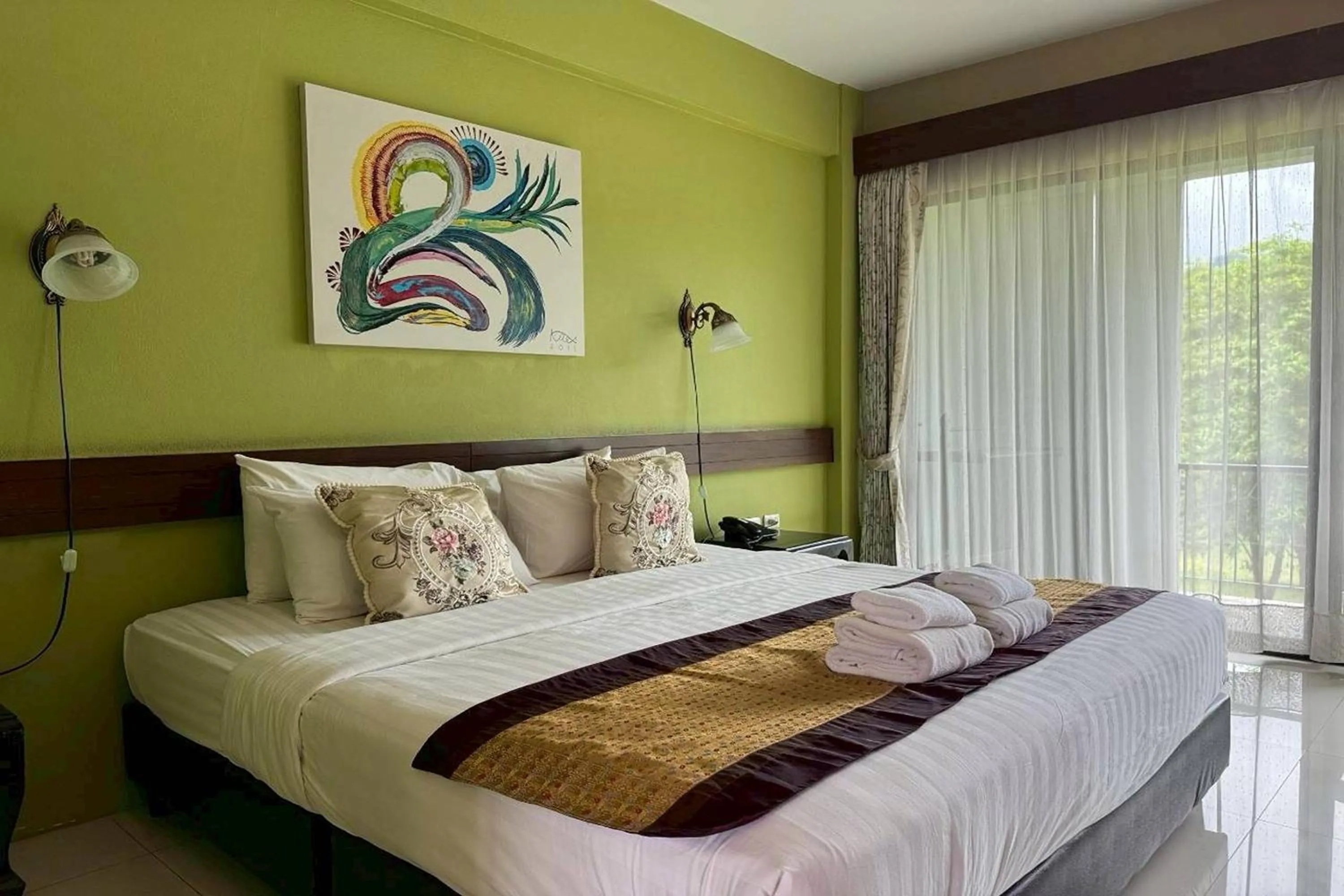 Photo of the whole room, Bed in Poonyamantra Resort Chiang Rai