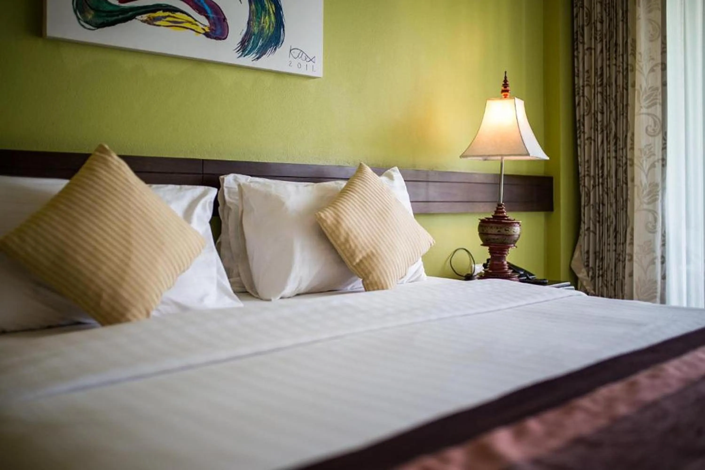 Photo of the whole room, Bed in Poonyamantra Resort Chiang Rai