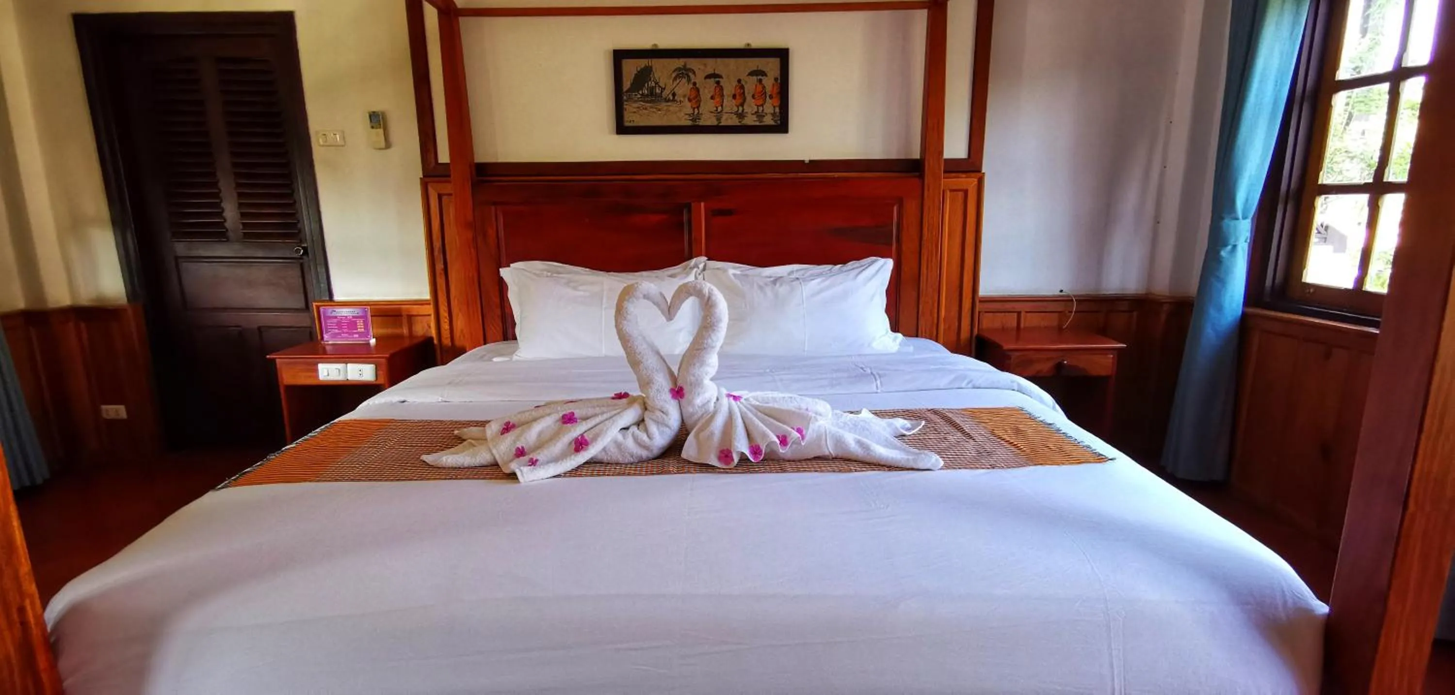 Bed in Luang Prabang Paradise Resort