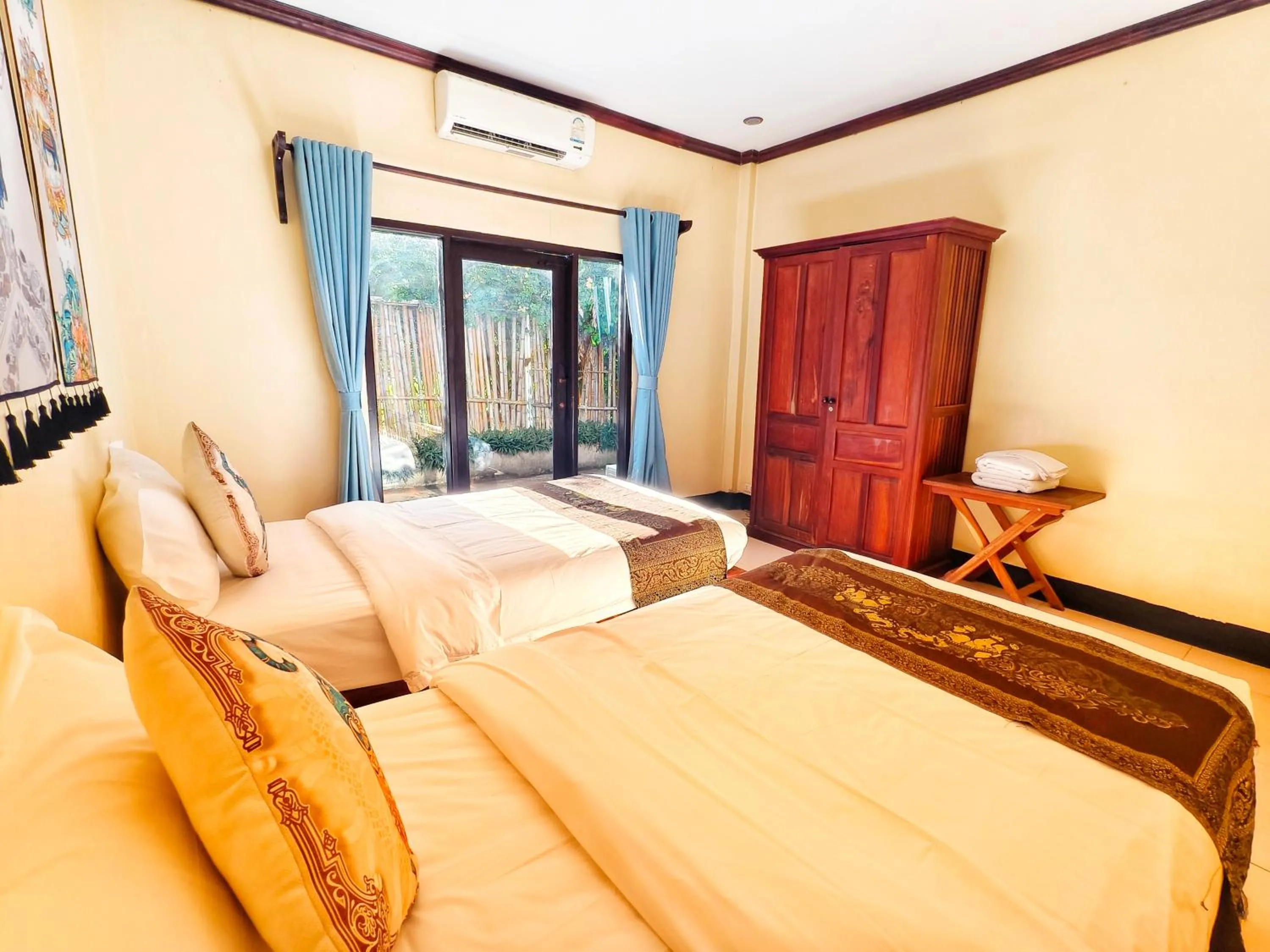 Bed in Luang Prabang chanon hotel