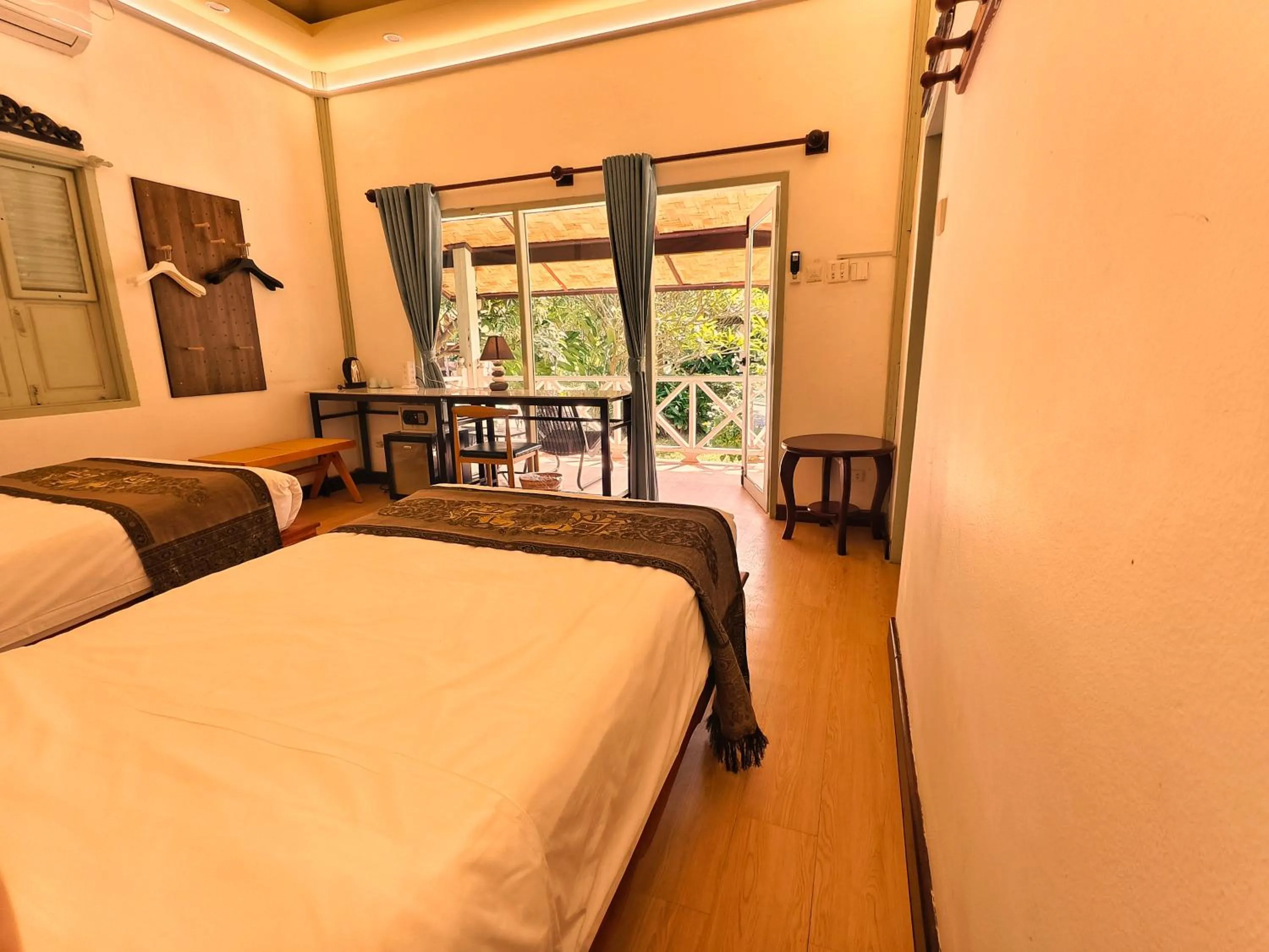 Bed in Luang Prabang chanon hotel