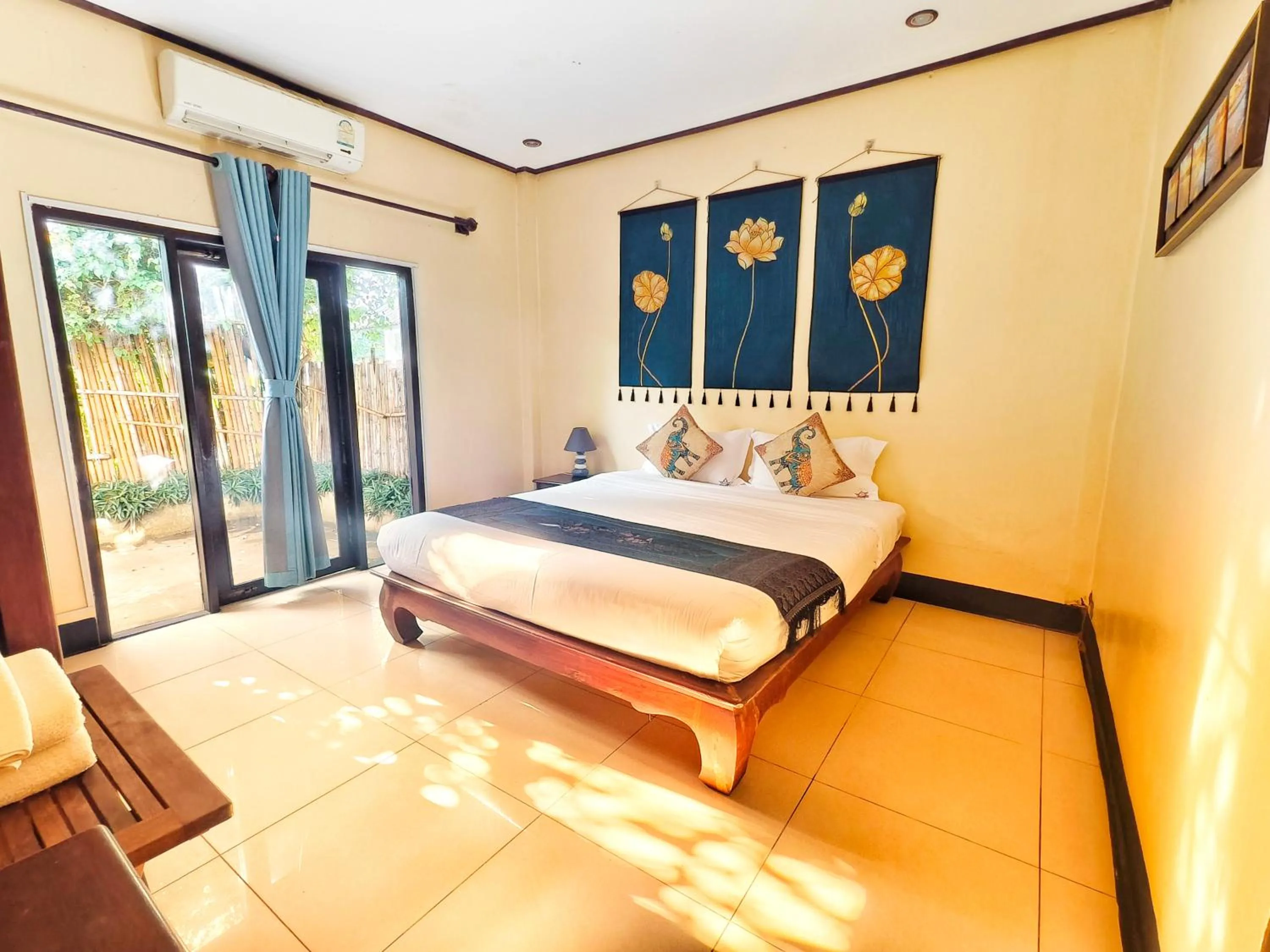 Bed in Luang Prabang chanon hotel