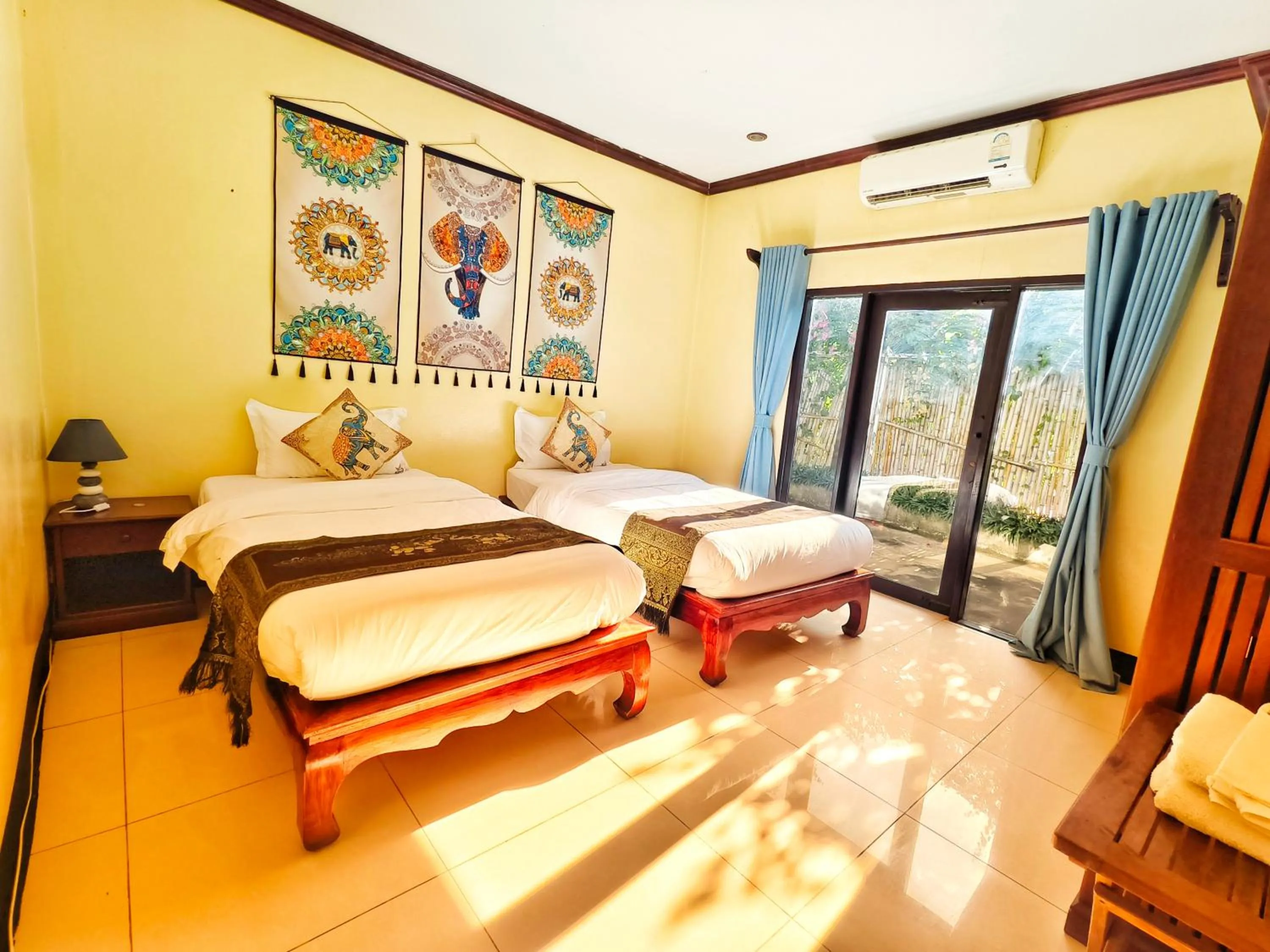 Bed in Luang Prabang chanon hotel