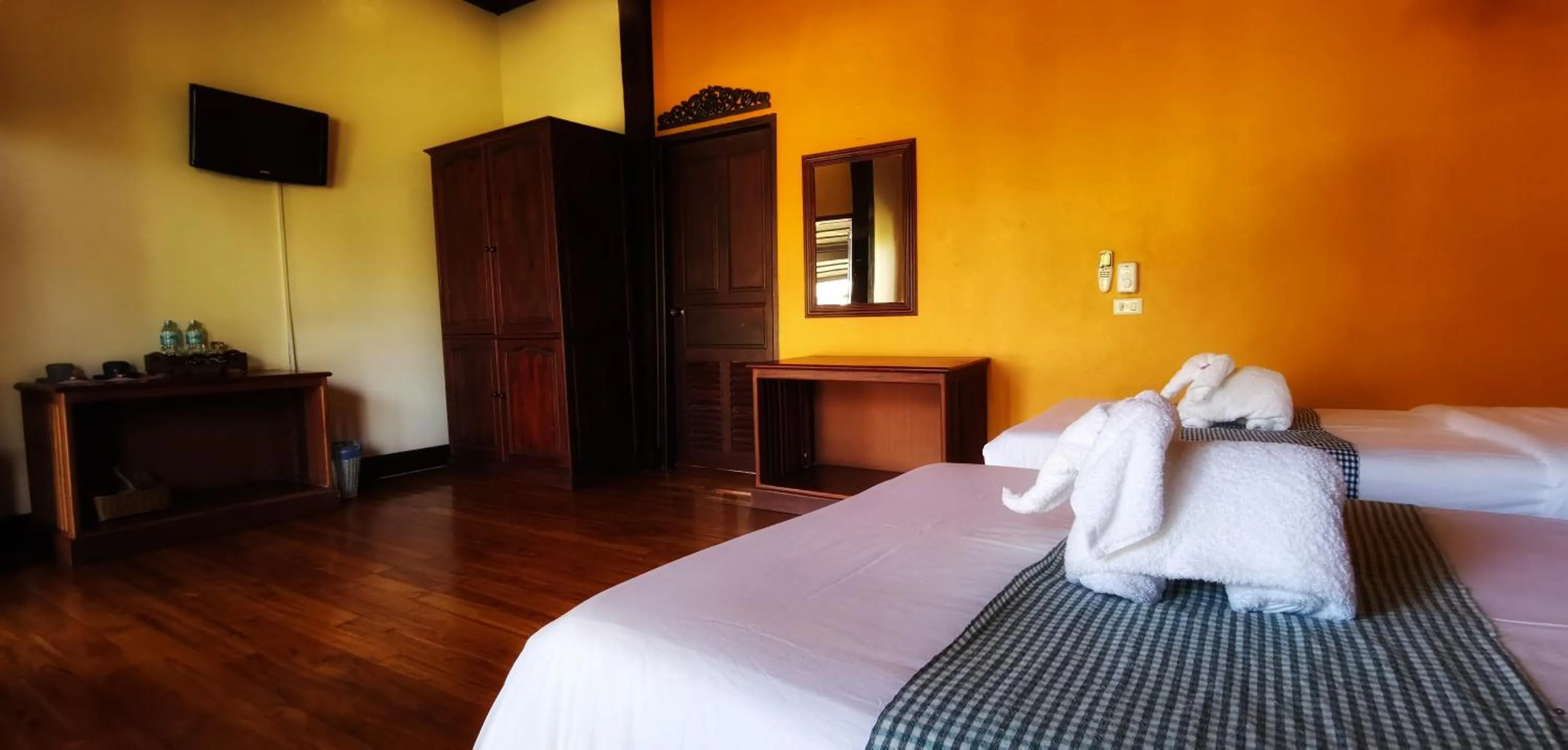 Bed in Luang Prabang Paradise Resort