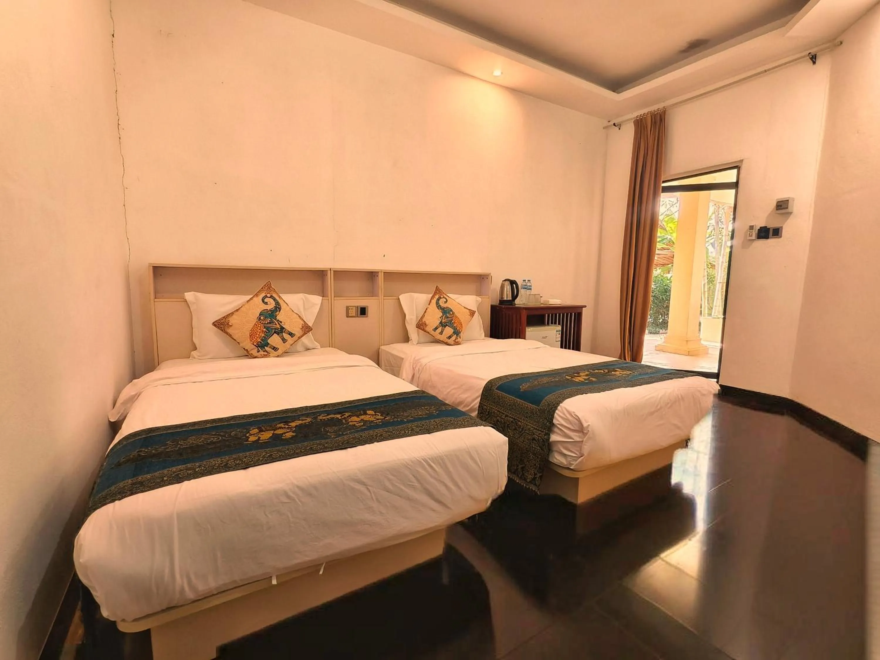 Bed in Luang Prabang chanon hotel