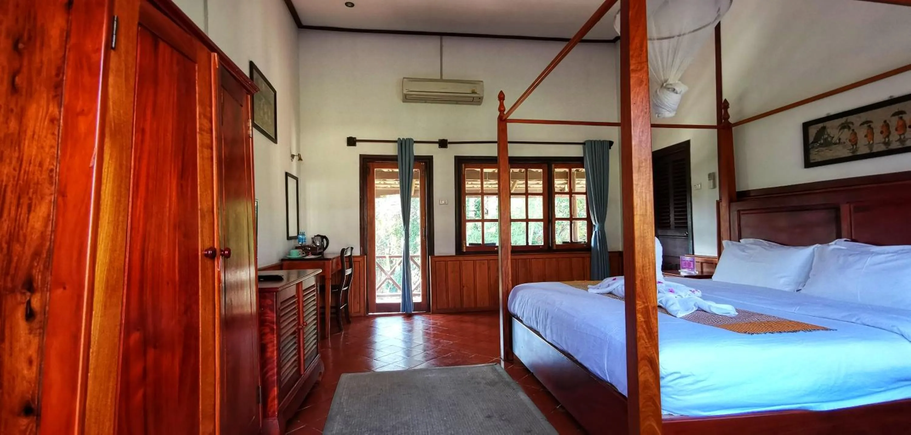 Bed in Luang Prabang Paradise Resort