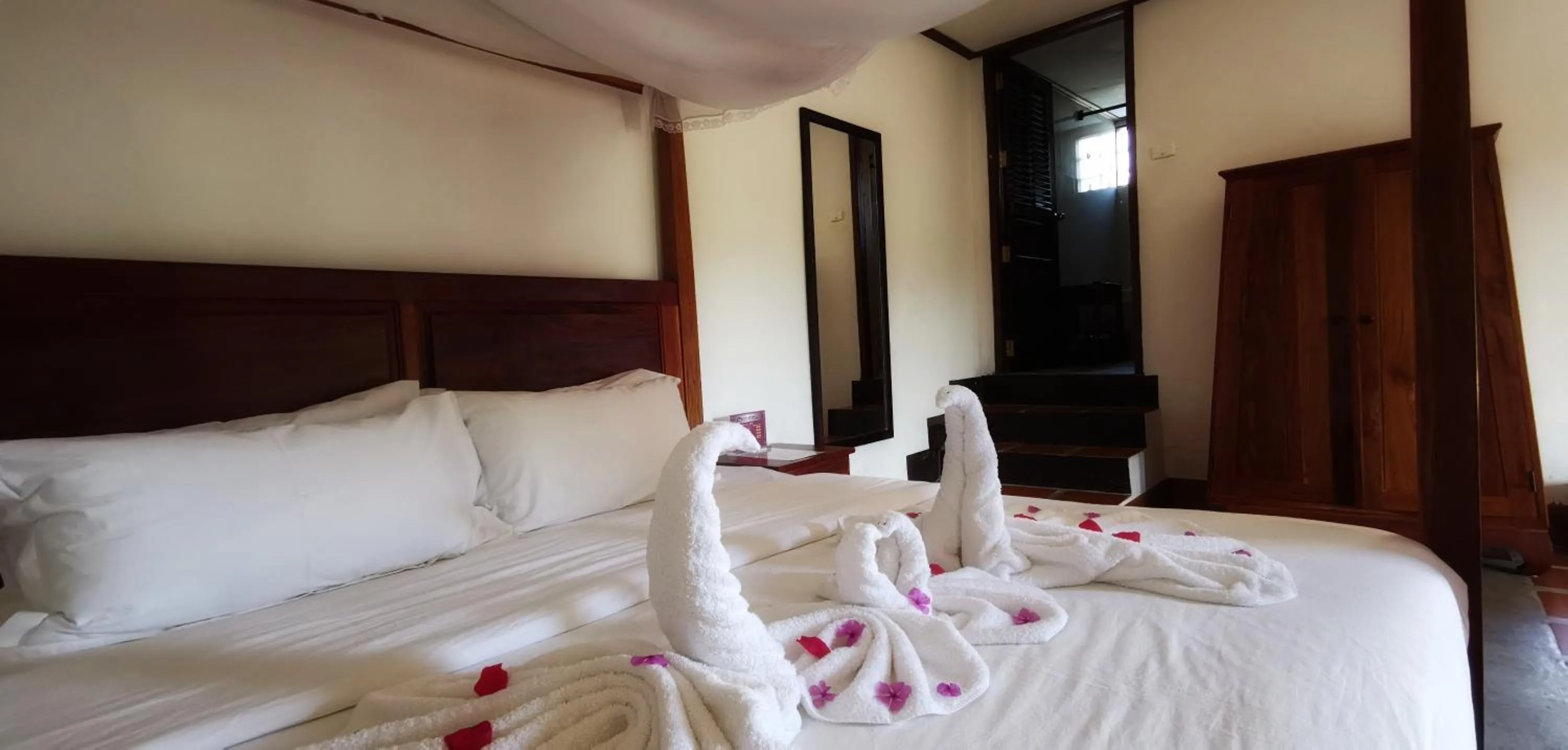 Bed in Luang Prabang Paradise Resort