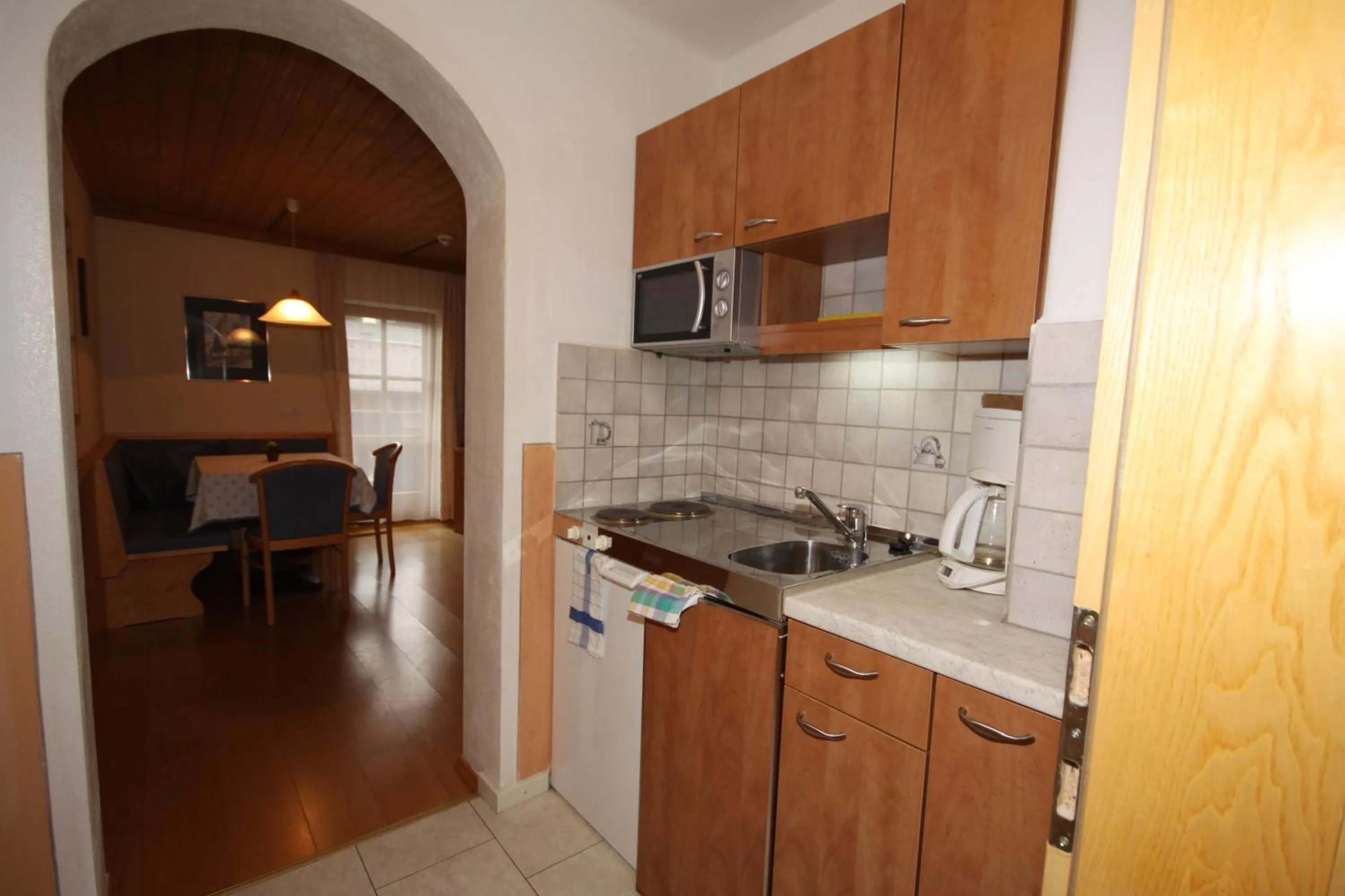 Kitchen or kitchenette in Ferienwohnungen Starchenthof - Wildschönau, Premiumcard inclusive