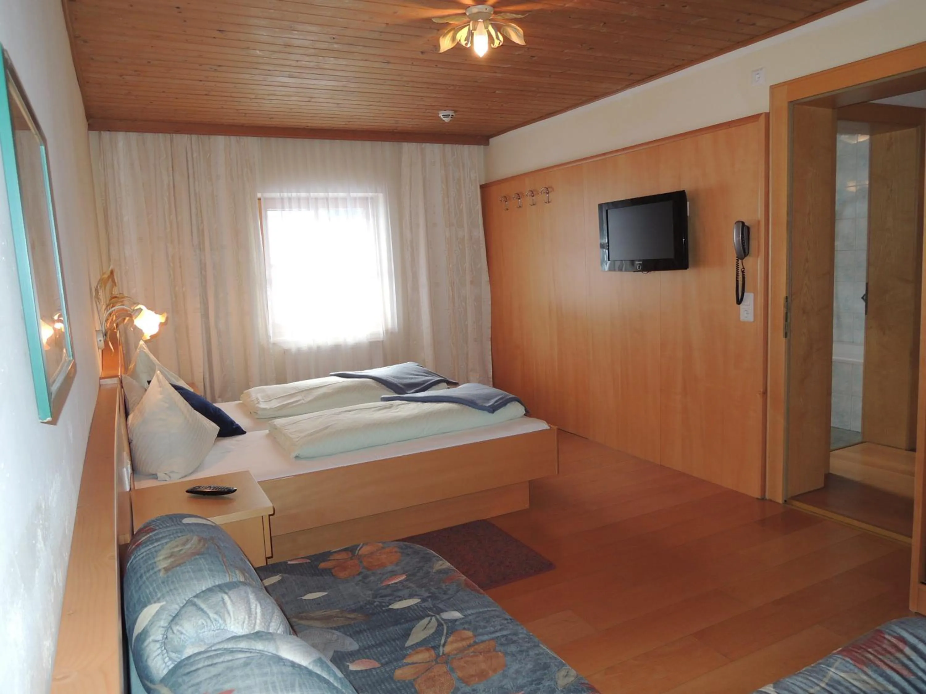 Bedroom, Bed in Ferienwohnungen Starchenthof - Wildschönau, Premiumcard inclusive