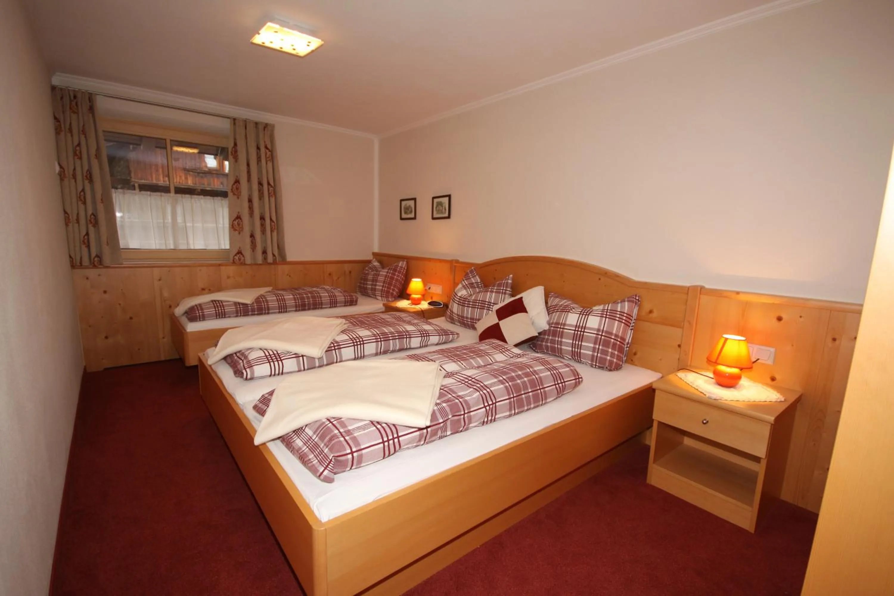 Bedroom, Bed in Ferienwohnungen Starchenthof - Wildschönau, Premiumcard inclusive