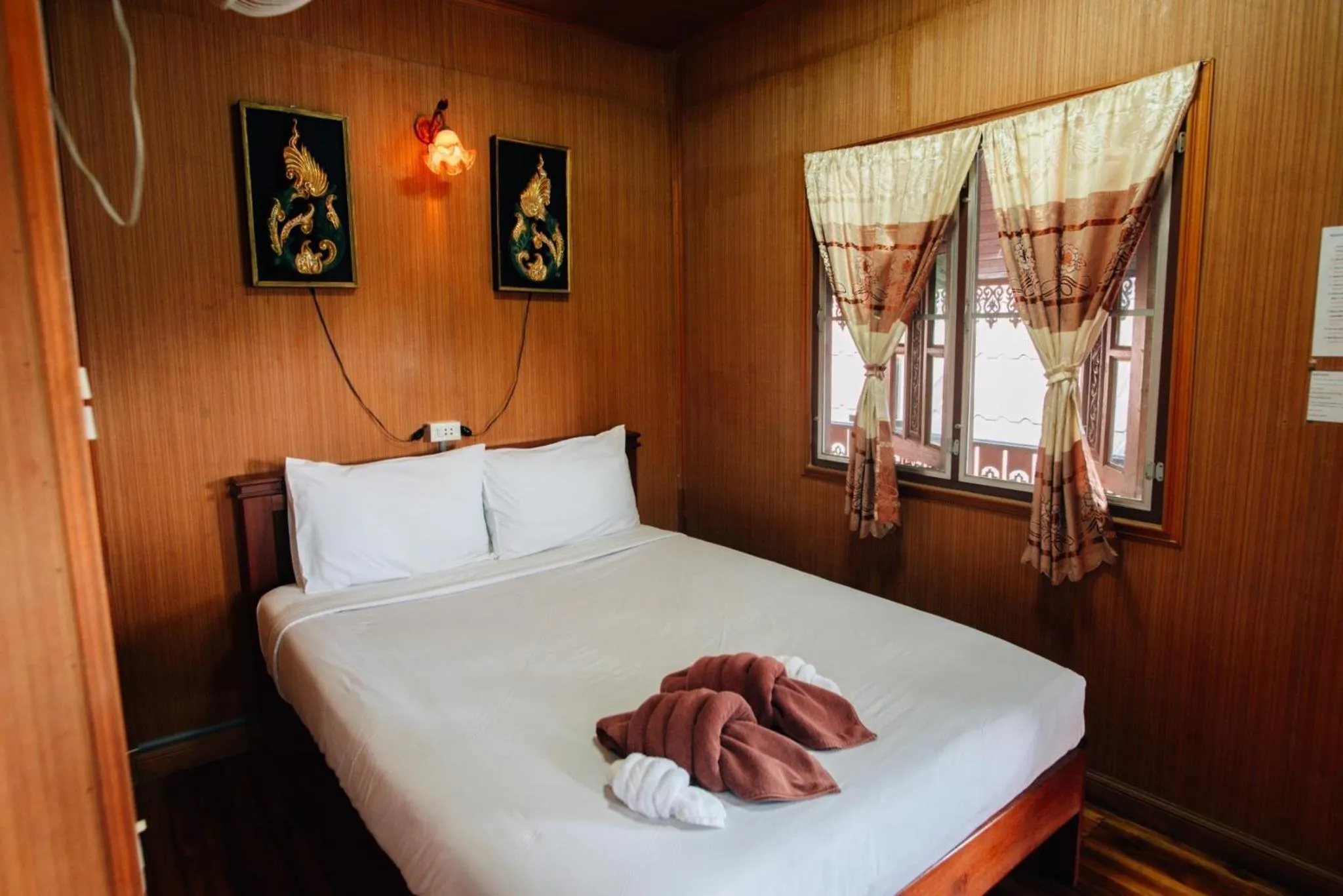 Bed in Noble Night Guesthouse