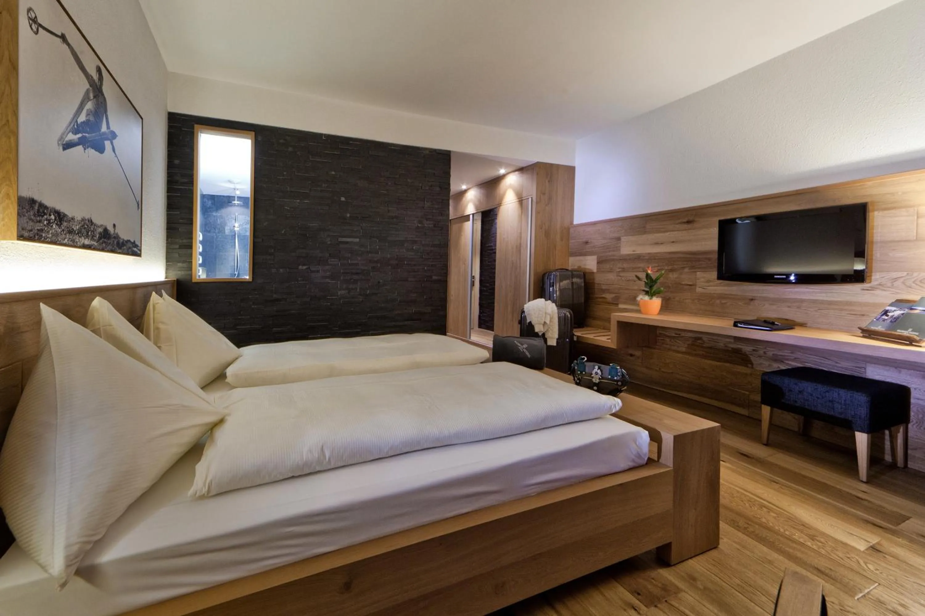 Photo of the whole room, Bed in Waldhotel Arosa