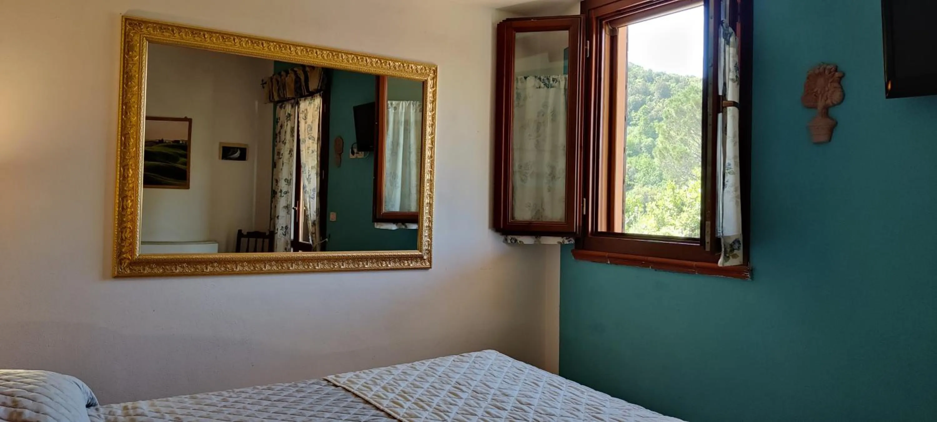Bedroom in Locanda Mossa Dei Barbari
