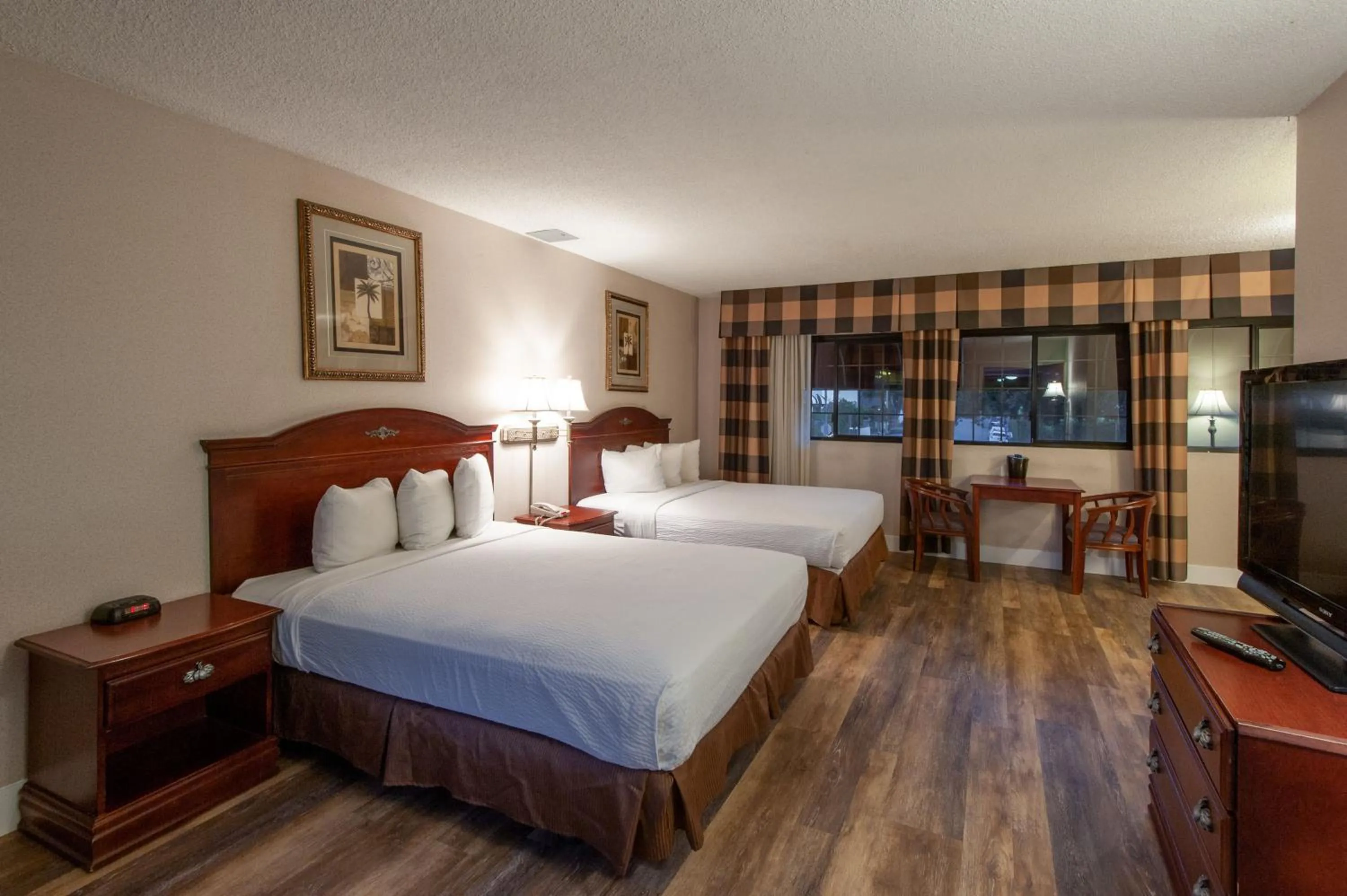 Photo of the whole room, Bed in Studio City Court Yard Hotel