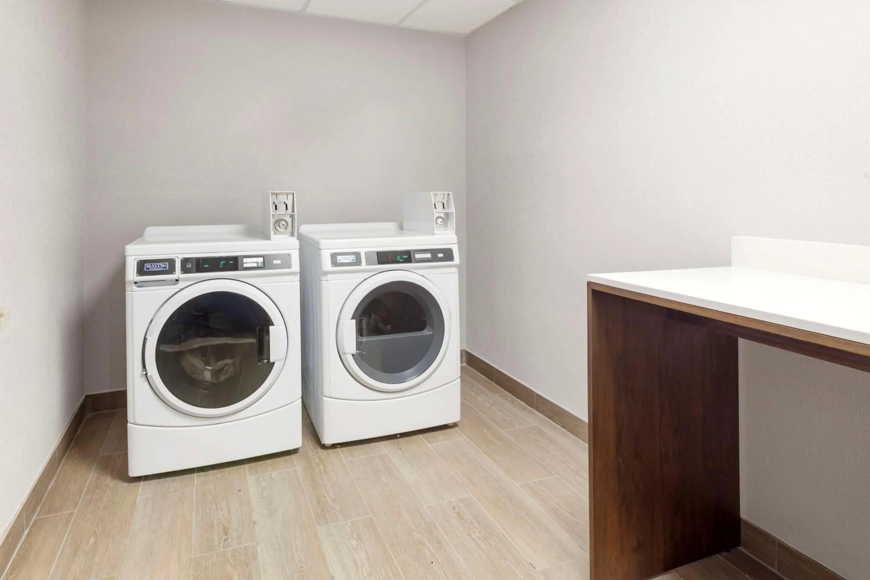 laundry in GLō Best Western Mississauga Corporate Centre