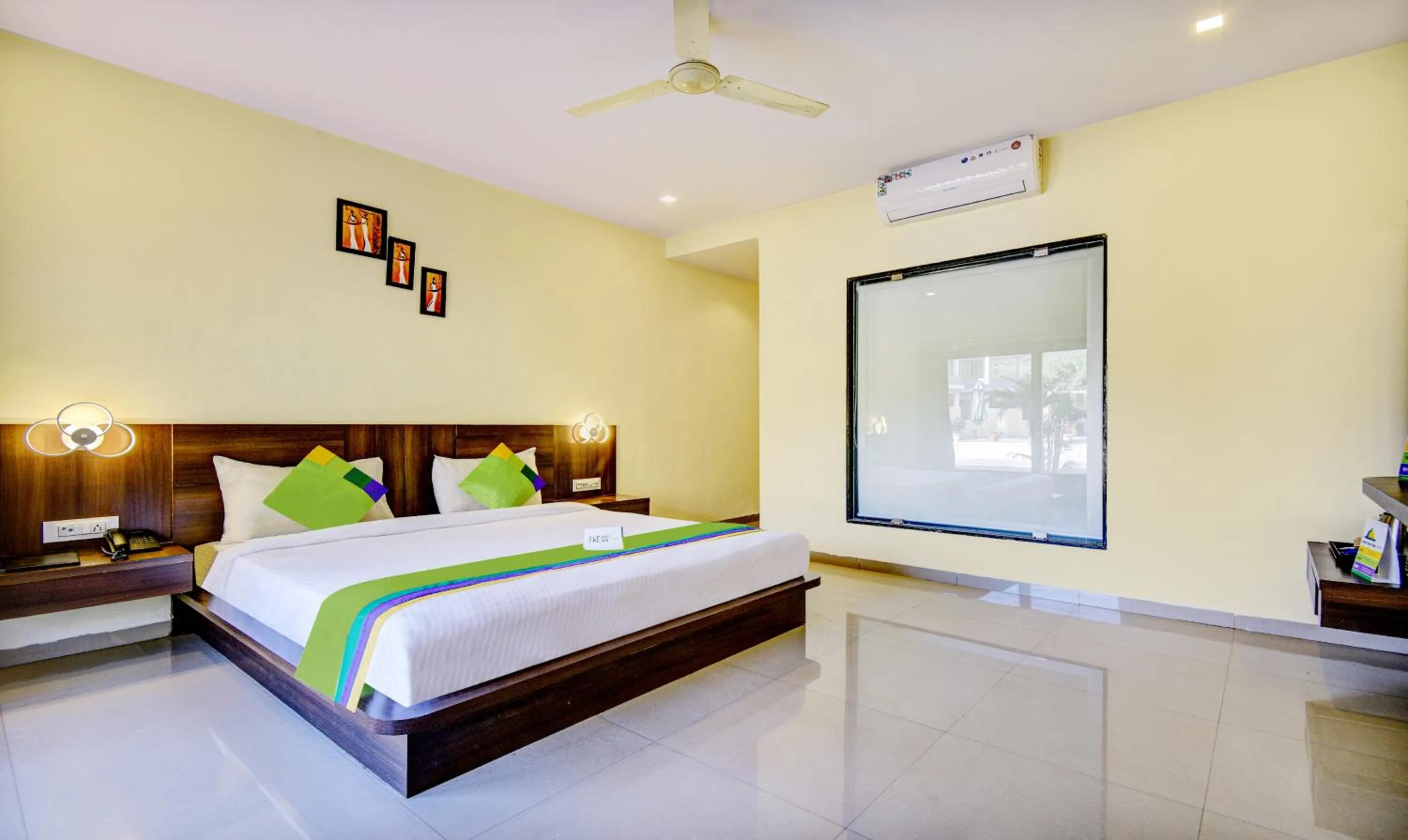 Bed in Treebo JP Cottage