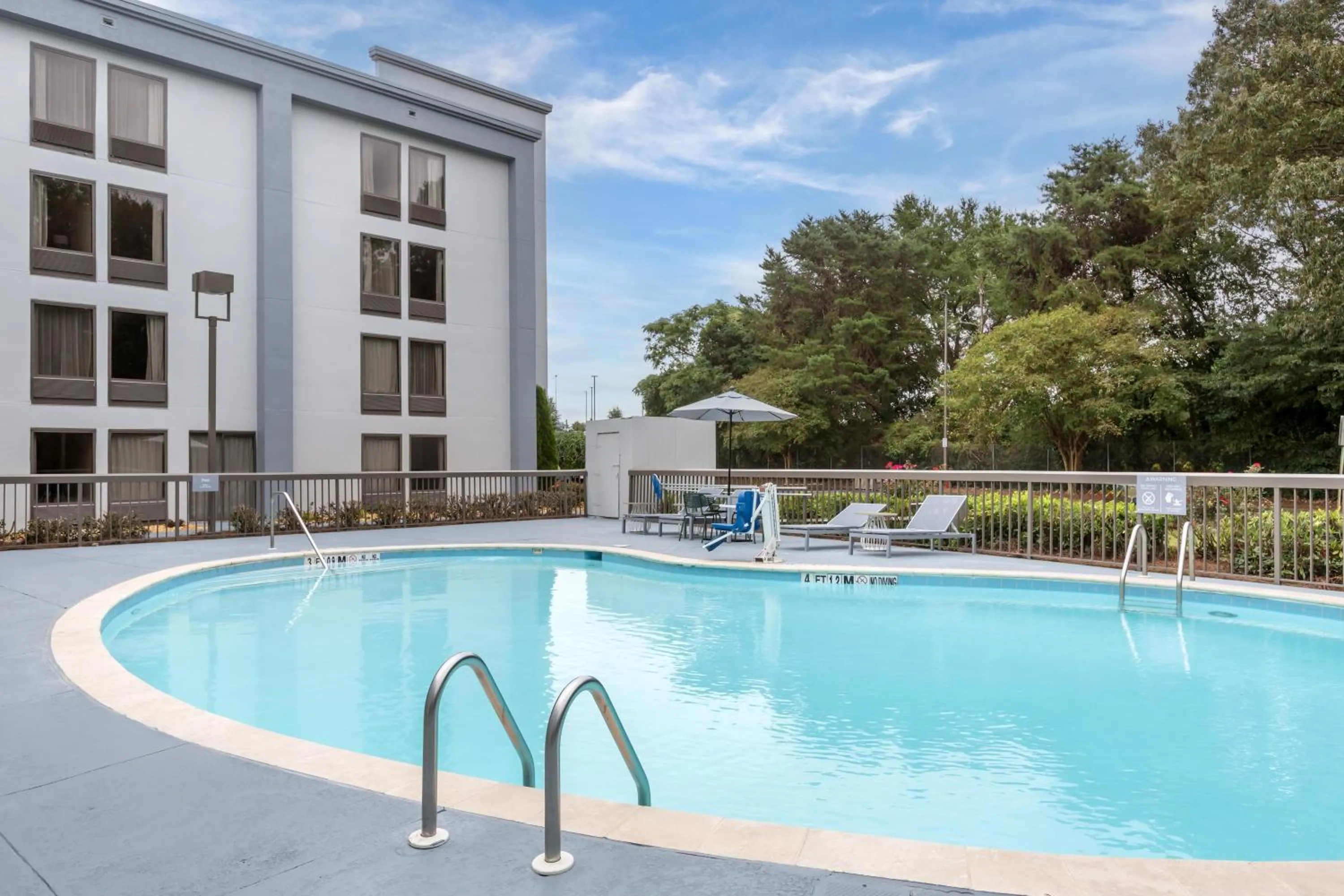 Pool view in Spark by Hilton Atlanta Airport South College Park