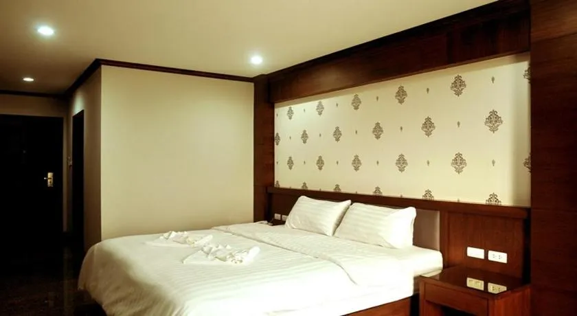 Bed in Green Hill Hotel Phayao