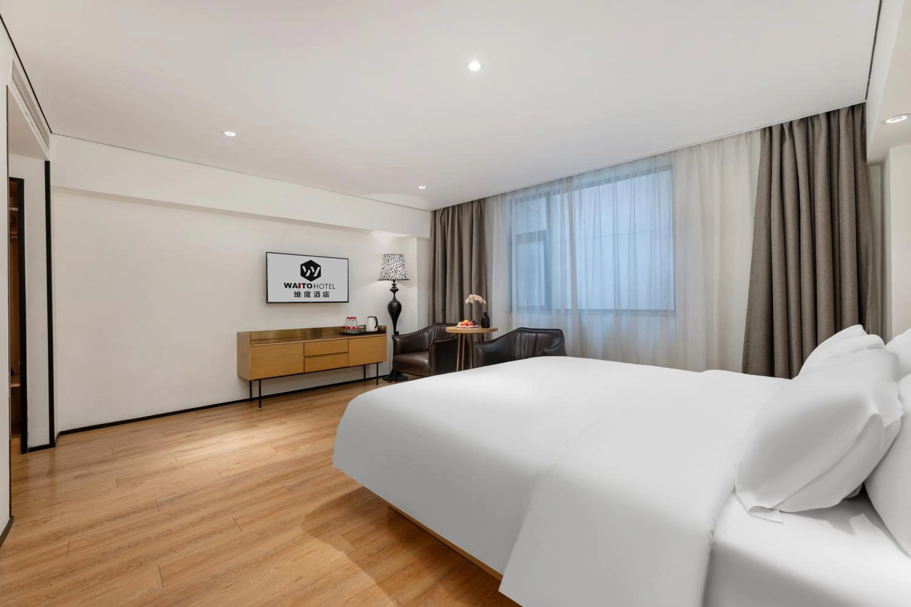 Photo of the whole room, Bed in Waito Hotel Yuexiu Park Guangzhou