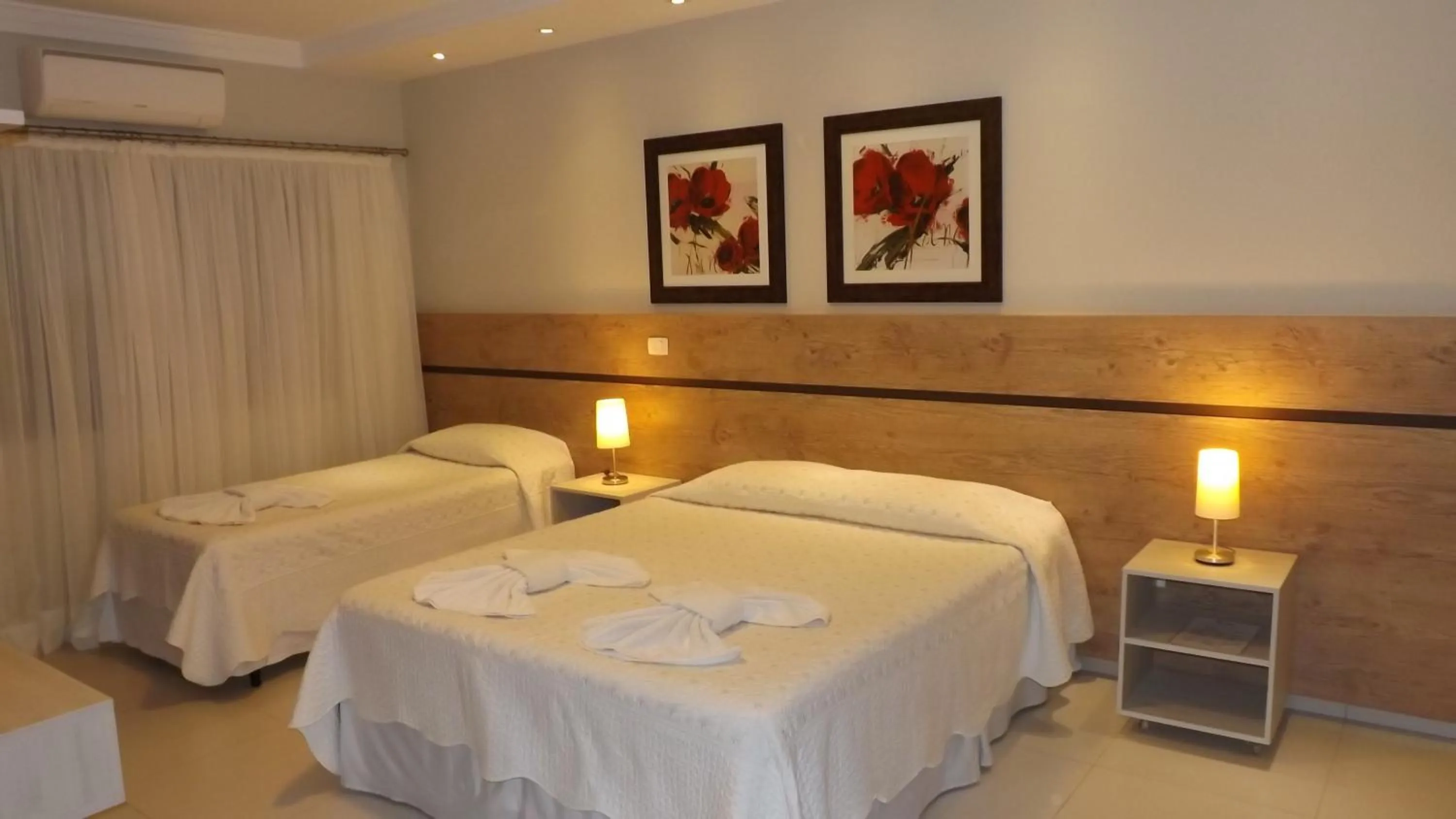 Photo of the whole room, Bed in Pousada Surucuá - Bonito MS