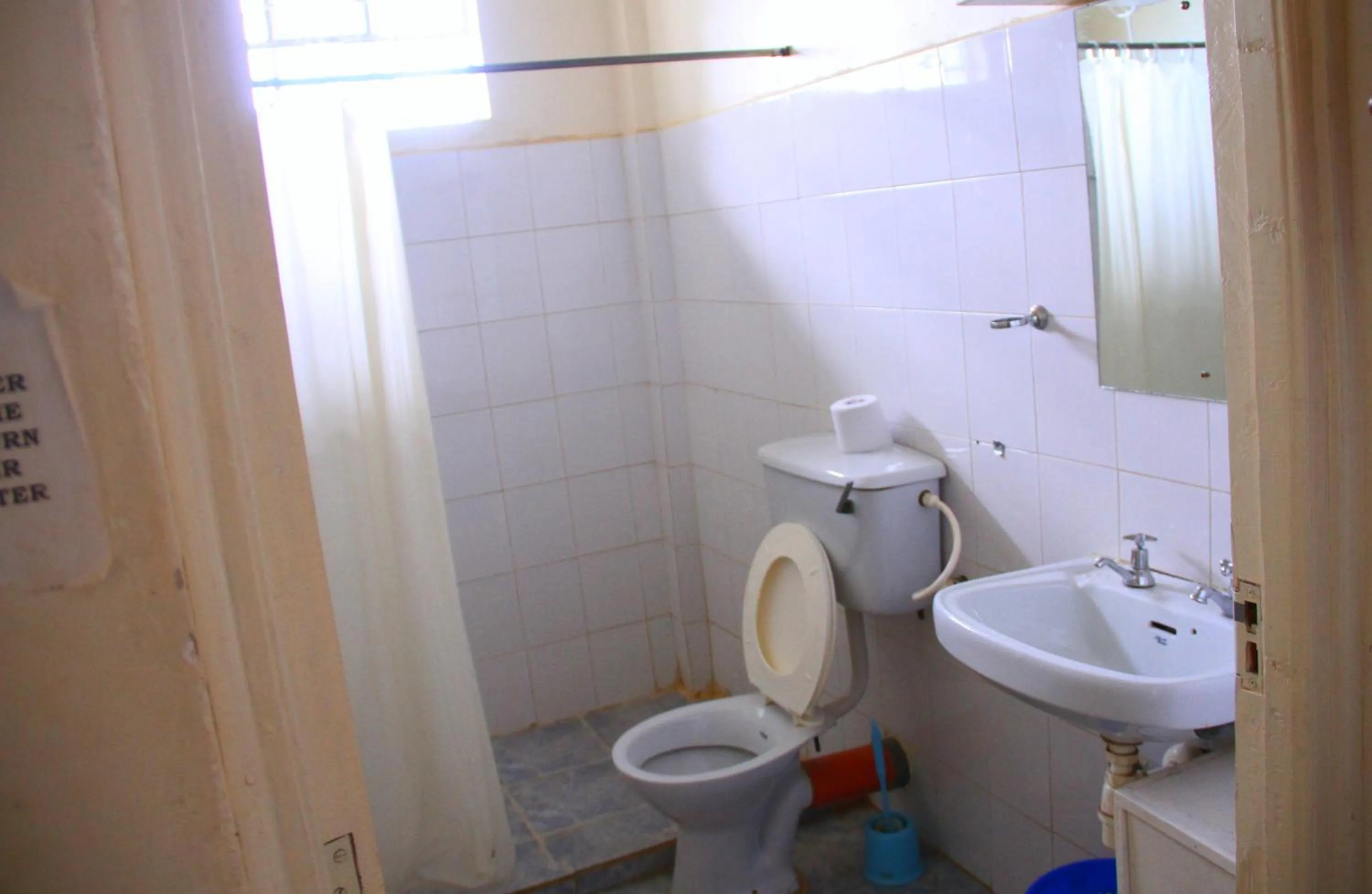 Toilet, Bathroom in Sheywe Hotel Kakamega